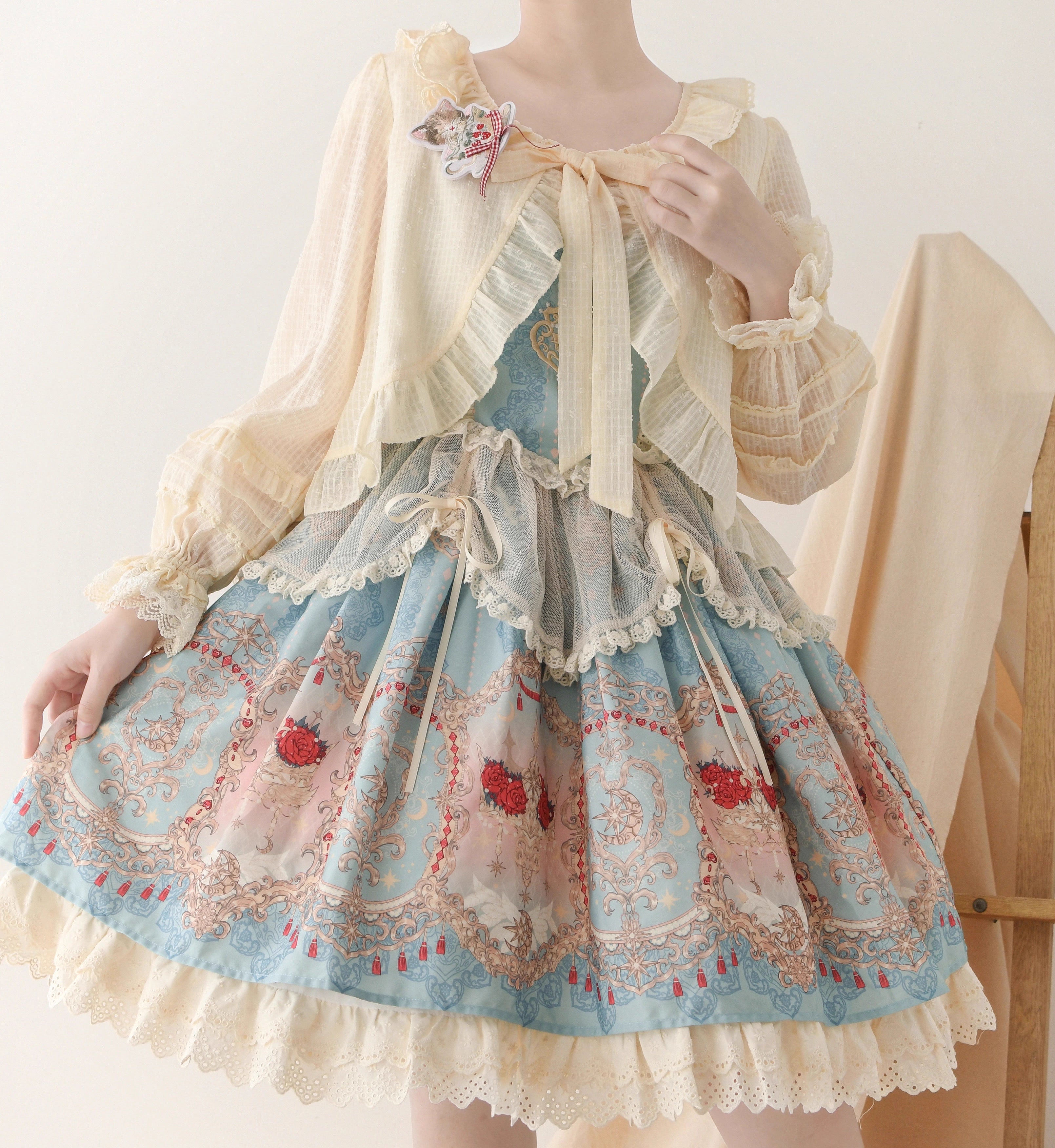 Design Concept:
This short Lolita outerwear cardigan is designed with a sweet and elegant touch, combining practicality with classic Lolita charm. The cropped silhouette highlights the waistline, while the long sleeves provide a delicate sun-protection function, making it a versatile piece for spring and summer. Available in Milky White and Apricot, the design brings a soft, feminine aura to any Lolita outfit.
