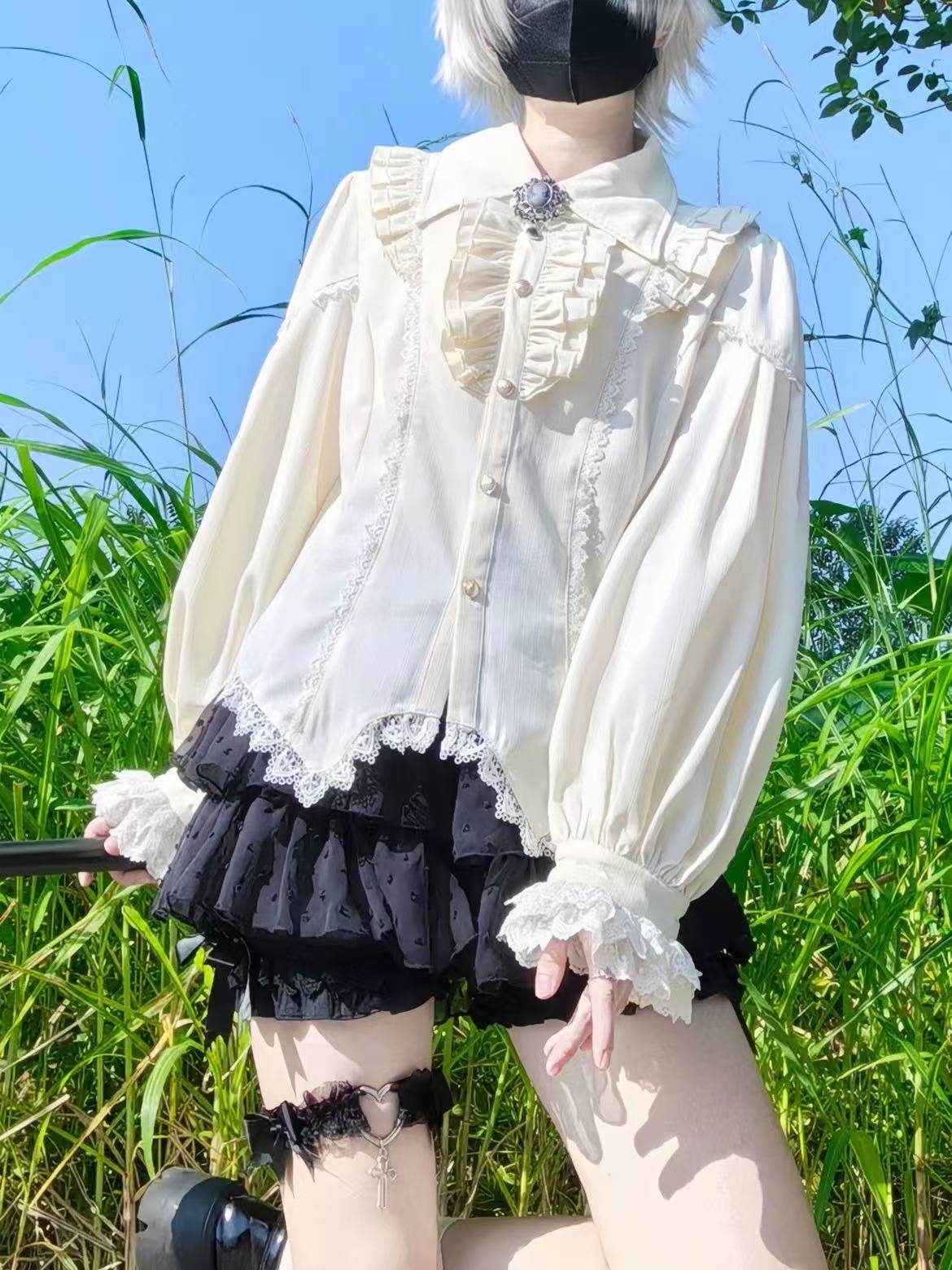 Design Concept:
This Lolita blouse features a pointed collar and long sleeves, crafted in a slim-fit vintage silhouette that blends classic elegance with modern Lolita charm. Available in White, Black, Burgundy, Gray, Beige, and Coffee, it offers versatile styling options to suit various outfits and occasions. The delicate tailoring and subtle detailing create a refined, timeless look, perfect for daily wear, tea parties, or seasonal Lolita ensembles.