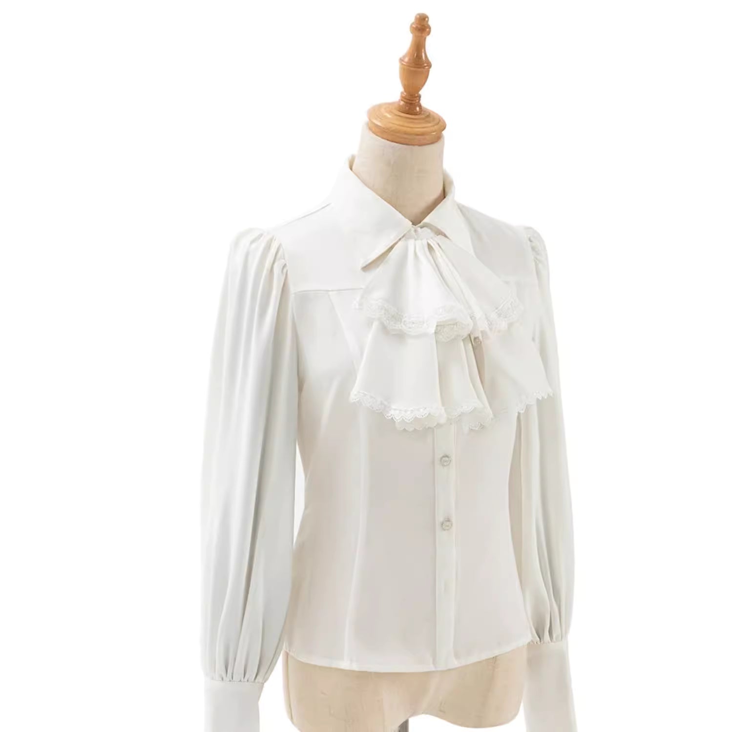 Design Concept:
This Lolita blouse in pure white features a pointed collar and elegant lantern sleeves, blending classic refinement with a versatile design. The slim-fit silhouette and soft fabric make it perfect as an inner layer for JSKs or as a standalone top, creating an effortlessly elegant Lolita look. Ideal for daily wear, tea parties, or casual gatherings, it combines sophistication with comfort, making it a staple piece in any Lolita wardrobe.