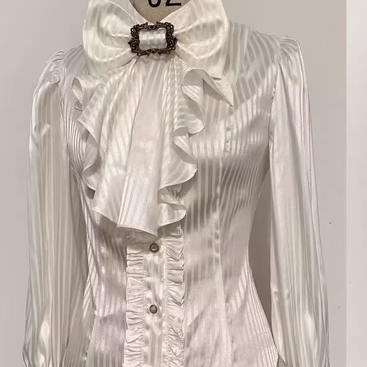 Design Concept:

This Lolita blouse in purple, white, and black blends Gothic charm with French vintage elegance. Designed with delicate tailoring and long sleeves, it creates a dramatic yet refined silhouette that is perfect for layering under Lolita dresses or wearing as a statement piece on its own. The versatile design makes it suitable for tea parties, cosplay events, and vintage-inspired gatherings, while the soft fabric ensures both comfort and style.
