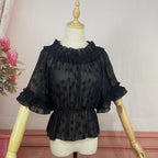 Delve into dreamy elegance with this Lolita chiffon blouse. Delicate prints adorn the lightweight, sheer fabric, while the elastic neckline offers a comfortable yet chic fit. Designed as a crop top, it pairs perfectly with JSK dresses, adding a layer of ethereal charm. The short sleeves and breathable material make it ideal for summer wear. Embrace a blend of whimsy and sophistication, perfect for creating a captivating Lolita ensemble that’s both graceful and stylish.