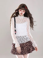This unique cream and blue cardigan features a charming snowman Fair Isle pattern, blending whimsical holiday spirit with coziness. The relaxed open-front design offers effortless layering versatility. Crafted from soft, premium knit, it provides luxurious comfort for seasonal gatherings or casual wear. A perfect fusion of nostalgic craftsmanship and contemporary comfort for those seeking understated yet distinctive holiday style.