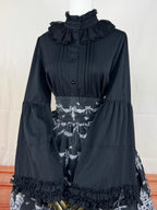Design Concept:
This Lolita blouse features a stand collar and elegant princess sleeves, crafted in a Gothic punk style for a bold, edgy look. The long sleeves and slim-fit design make it ideal as an inner layer or statement top, adding a sophisticated yet daring touch to any Lolita ensemble. Available in Black, it complements a variety of Gothic and punk-inspired outfits.