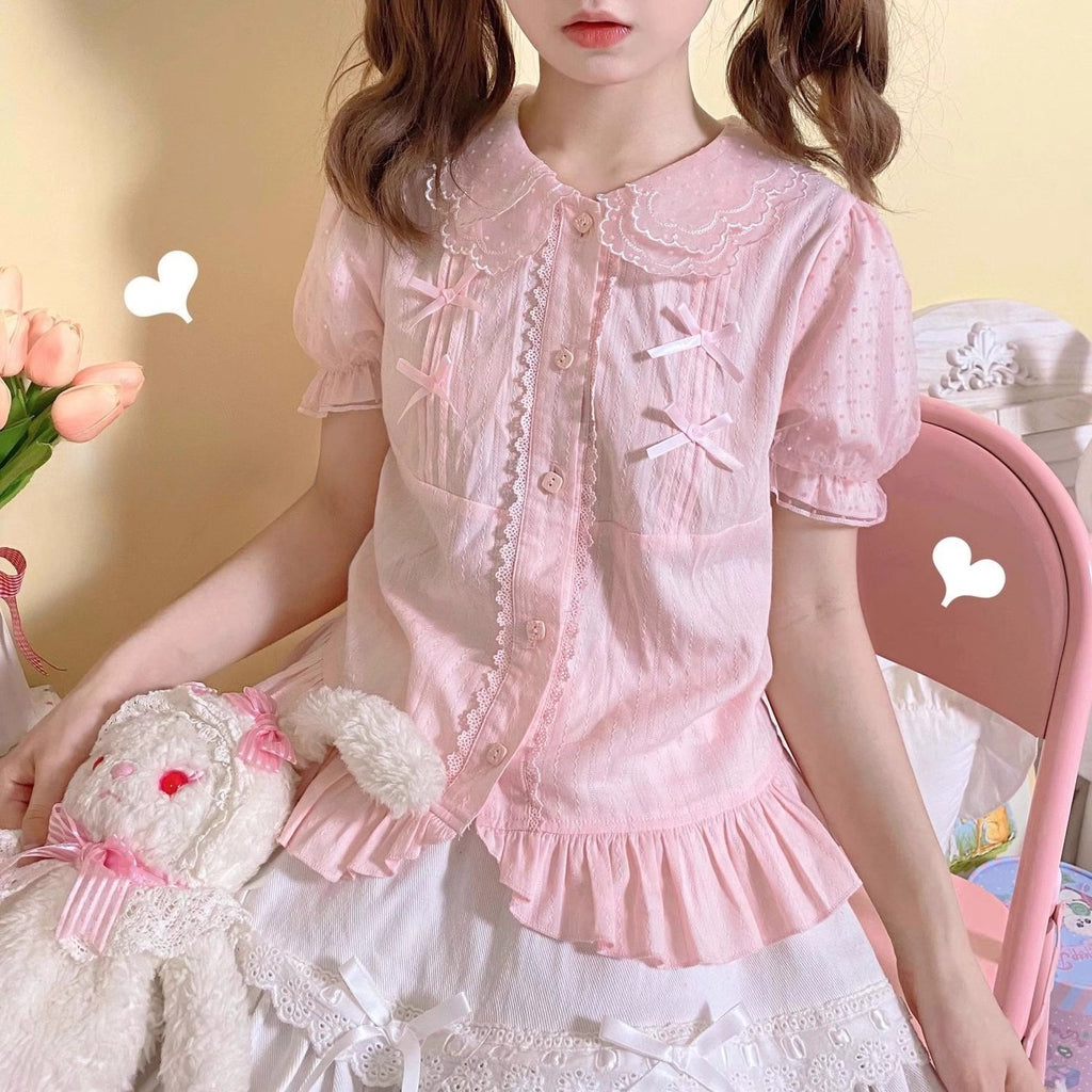 Design Concept:
This sweet Lolita blouse is designed with a short-sleeve cut and adorned with a delicate bow, perfectly capturing a cute and youthful charm. Crafted in white, soft light yellow, and pastel pink, the blouse offers versatile styling options to suit different moods and coordinates. The lightweight fabric ensures comfort while maintaining a refined silhouette, making it an ideal piece to layer under JSKs or pair with Lolita skirts. Whether for daily wear or a tea party, this blouse adds a playfu