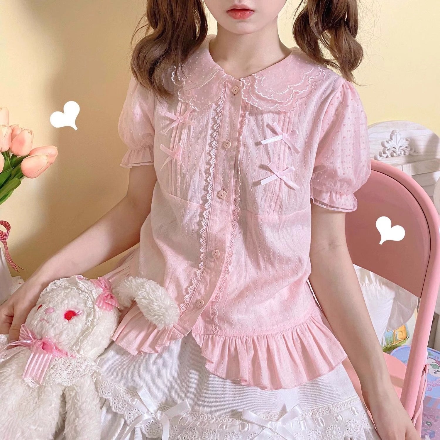 Design Concept:
This sweet Lolita blouse is designed with a short-sleeve cut and adorned with a delicate bow, perfectly capturing a cute and youthful charm. Crafted in white, soft light yellow, and pastel pink, the blouse offers versatile styling options to suit different moods and coordinates. The lightweight fabric ensures comfort while maintaining a refined silhouette, making it an ideal piece to layer under JSKs or pair with Lolita skirts. Whether for daily wear or a tea party, this blouse adds a playfu