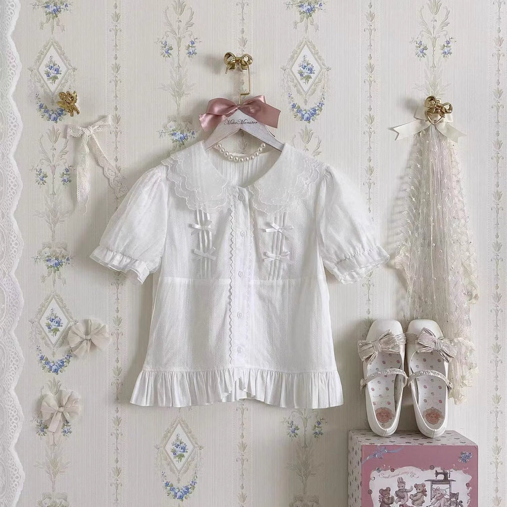 Design Concept:
This sweet Lolita blouse is designed with a short-sleeve cut and adorned with a delicate bow, perfectly capturing a cute and youthful charm. Crafted in white, soft light yellow, and pastel pink, the blouse offers versatile styling options to suit different moods and coordinates. The lightweight fabric ensures comfort while maintaining a refined silhouette, making it an ideal piece to layer under JSKs or pair with Lolita skirts. Whether for daily wear or a tea party, this blouse adds a playfu