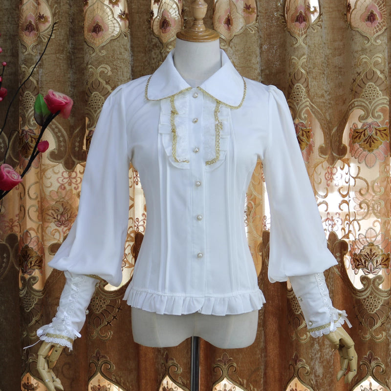 Design Concept:
This collection of Lolita blouses features a slim-fit silhouette with a delicate doll collar and elegant lantern sleeves, combining vintage charm with a refined Lolita aesthetic. The three styles include Pure White, White with Gold Trim, and Black with Gold Trim, offering a range of options from classic elegance to subtly luxurious Gothic-inspired looks.