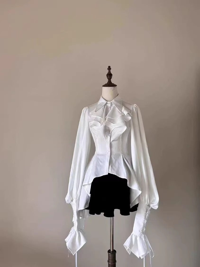 Design Concept:

This Lolita blouse is a charming blend of vintage and medieval aesthetics, designed as a prince-style long-sleeve shirt perfect for layering or cosplay. Crafted in classic white and black, it features meticulous detailing that highlights the timeless elegance of Lolita fashion. The blouse offers a comfortable loose fit while maintaining a structured silhouette, making it ideal for daily wear, themed events, or tea parties. Pair it with skirts or trousers for a refined, versatile look that e