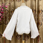 This elegant blouse masterfully blends Victorian romance with subtle Chinese-inspired aesthetics. The dramatic double-layer bishop sleeves and delicate drawstring details create a luxurious, poetic silhouette. Topped with a classic bow tie, it offers a timeless look. Designed for the modern Lolita enthusiast, this undershirt is crafted from premium materials for both comfort and sophistication, making it the perfect foundational piece for creating a statement layered outfit that is both graceful and uniquel