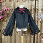 This elegant blouse masterfully blends Victorian romance with subtle Chinese-inspired aesthetics. The dramatic double-layer bishop sleeves and delicate drawstring details create a luxurious, poetic silhouette. Topped with a classic bow tie, it offers a timeless look. Designed for the modern Lolita enthusiast, this undershirt is crafted from premium materials for both comfort and sophistication, making it the perfect foundational piece for creating a statement layered outfit that is both graceful and uniquel