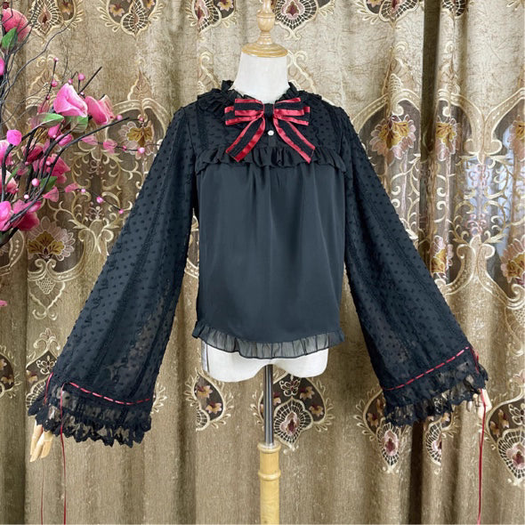 This elegant blouse masterfully blends Victorian romance with subtle Chinese-inspired aesthetics. The dramatic double-layer bishop sleeves and delicate drawstring details create a luxurious, poetic silhouette. Topped with a classic bow tie, it offers a timeless look. Designed for the modern Lolita enthusiast, this undershirt is crafted from premium materials for both comfort and sophistication, making it the perfect foundational piece for creating a statement layered outfit that is both graceful and uniquel