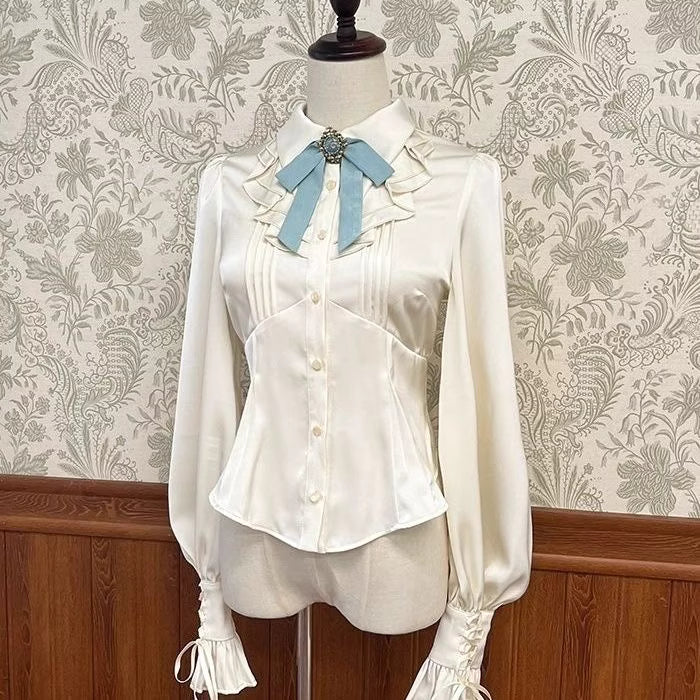 Design Concept:
This sweet Lolita blouse is designed with a short-sleeve cut and adorned with a delicate bow, perfectly capturing a cute and youthful charm. Crafted in white, soft light yellow, and pastel pink, the blouse offers versatile styling options to suit different moods and coordinates. The lightweight fabric ensures comfort while maintaining a refined silhouette, making it an ideal piece to layer under JSKs or pair with Lolita skirts. Whether for daily wear or a tea party, this blouse adds a playfu
