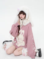 Inspired by the magic of making wishes, this dreamy sweater combines playful bunny motifs with soft romantic details. The adjustable tie-bow neckline and voluminous lantern sleeves create a whimsical silhouette, while the sweet pink and red palette evokes a sense of joyful charm. Lightweight yet cozy, it’s designed to bring a touch of fantasy to everyday wear—for those who believe in sweetness, magic, and self-expression.