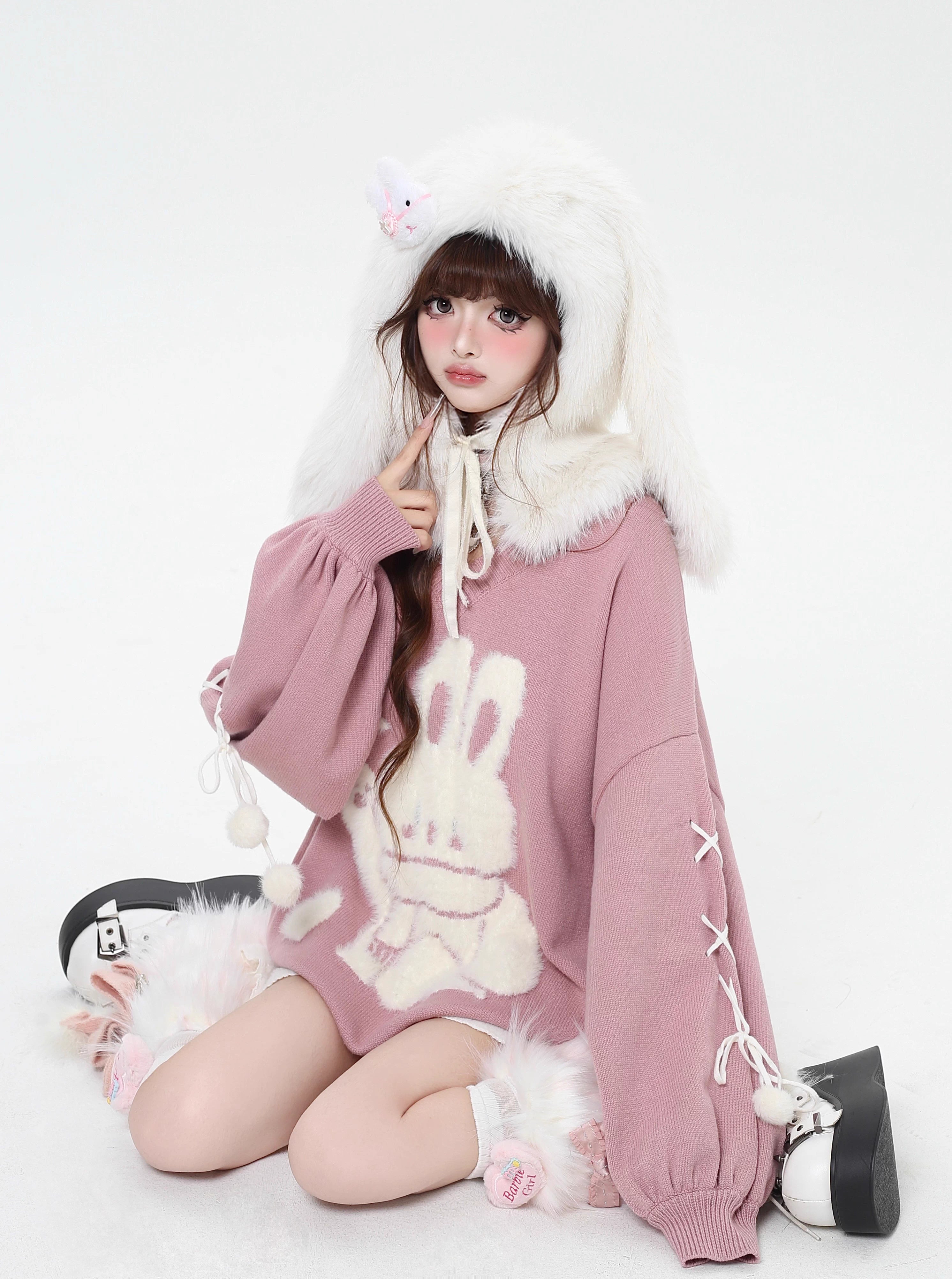 Inspired by the magic of making wishes, this dreamy sweater combines playful bunny motifs with soft romantic details. The adjustable tie-bow neckline and voluminous lantern sleeves create a whimsical silhouette, while the sweet pink and red palette evokes a sense of joyful charm. Lightweight yet cozy, it’s designed to bring a touch of fantasy to everyday wear—for those who believe in sweetness, magic, and self-expression.