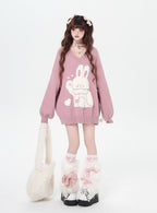 Inspired by the magic of making wishes, this dreamy sweater combines playful bunny motifs with soft romantic details. The adjustable tie-bow neckline and voluminous lantern sleeves create a whimsical silhouette, while the sweet pink and red palette evokes a sense of joyful charm. Lightweight yet cozy, it’s designed to bring a touch of fantasy to everyday wear—for those who believe in sweetness, magic, and self-expression.