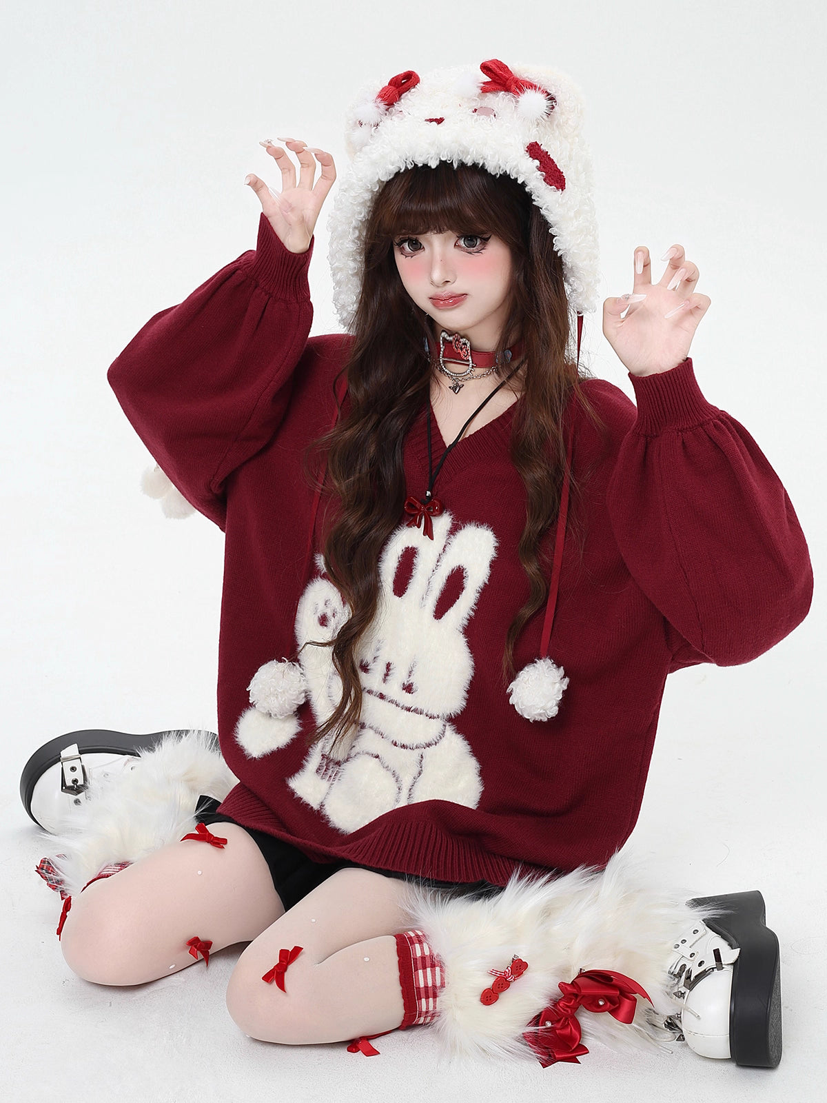 Inspired by the magic of making wishes, this dreamy sweater combines playful bunny motifs with soft romantic details. The adjustable tie-bow neckline and voluminous lantern sleeves create a whimsical silhouette, while the sweet pink and red palette evokes a sense of joyful charm. Lightweight yet cozy, it’s designed to bring a touch of fantasy to everyday wear—for those who believe in sweetness, magic, and self-expression.