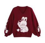Inspired by the magic of making wishes, this dreamy sweater combines playful bunny motifs with soft romantic details. The adjustable tie-bow neckline and voluminous lantern sleeves create a whimsical silhouette, while the sweet pink and red palette evokes a sense of joyful charm. Lightweight yet cozy, it’s designed to bring a touch of fantasy to everyday wear—for those who believe in sweetness, magic, and self-expression.