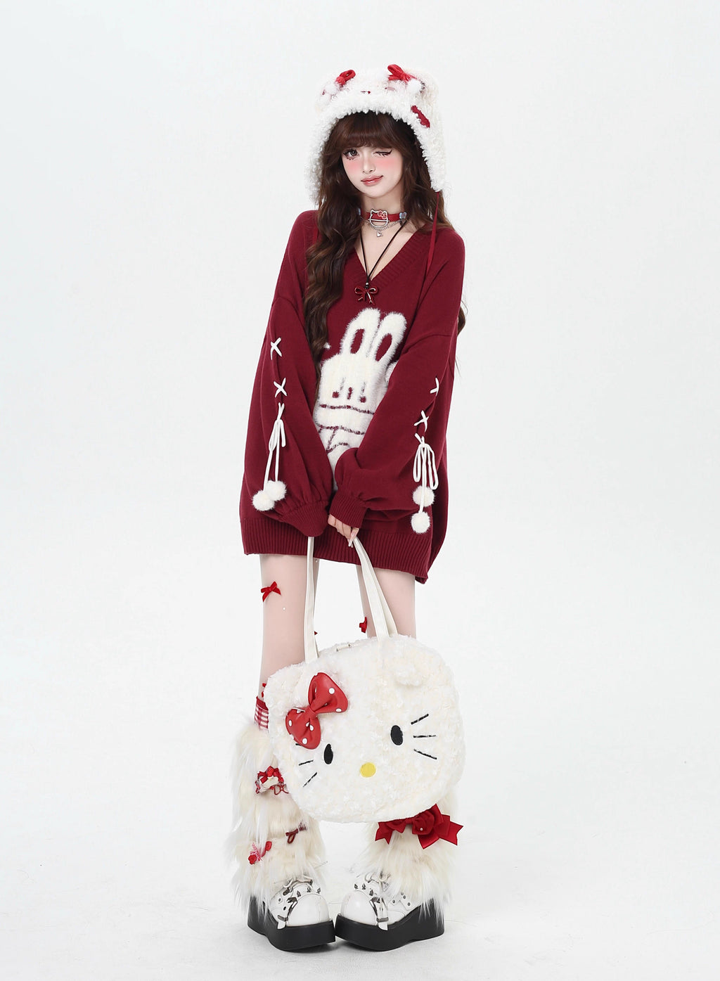 Inspired by the magic of making wishes, this dreamy sweater combines playful bunny motifs with soft romantic details. The adjustable tie-bow neckline and voluminous lantern sleeves create a whimsical silhouette, while the sweet pink and red palette evokes a sense of joyful charm. Lightweight yet cozy, it’s designed to bring a touch of fantasy to everyday wear—for those who believe in sweetness, magic, and self-expression.