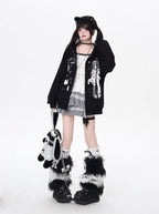 This hoodie blends playful anime-inspired graphics with a relaxed, street-ready silhouette. The high-contrast black and white design creates a bold yet cute statement, while the soft fabric and loose fit ensure all-day comfort. Ideal for expressing quirky, individual style with a touch of urban edge.