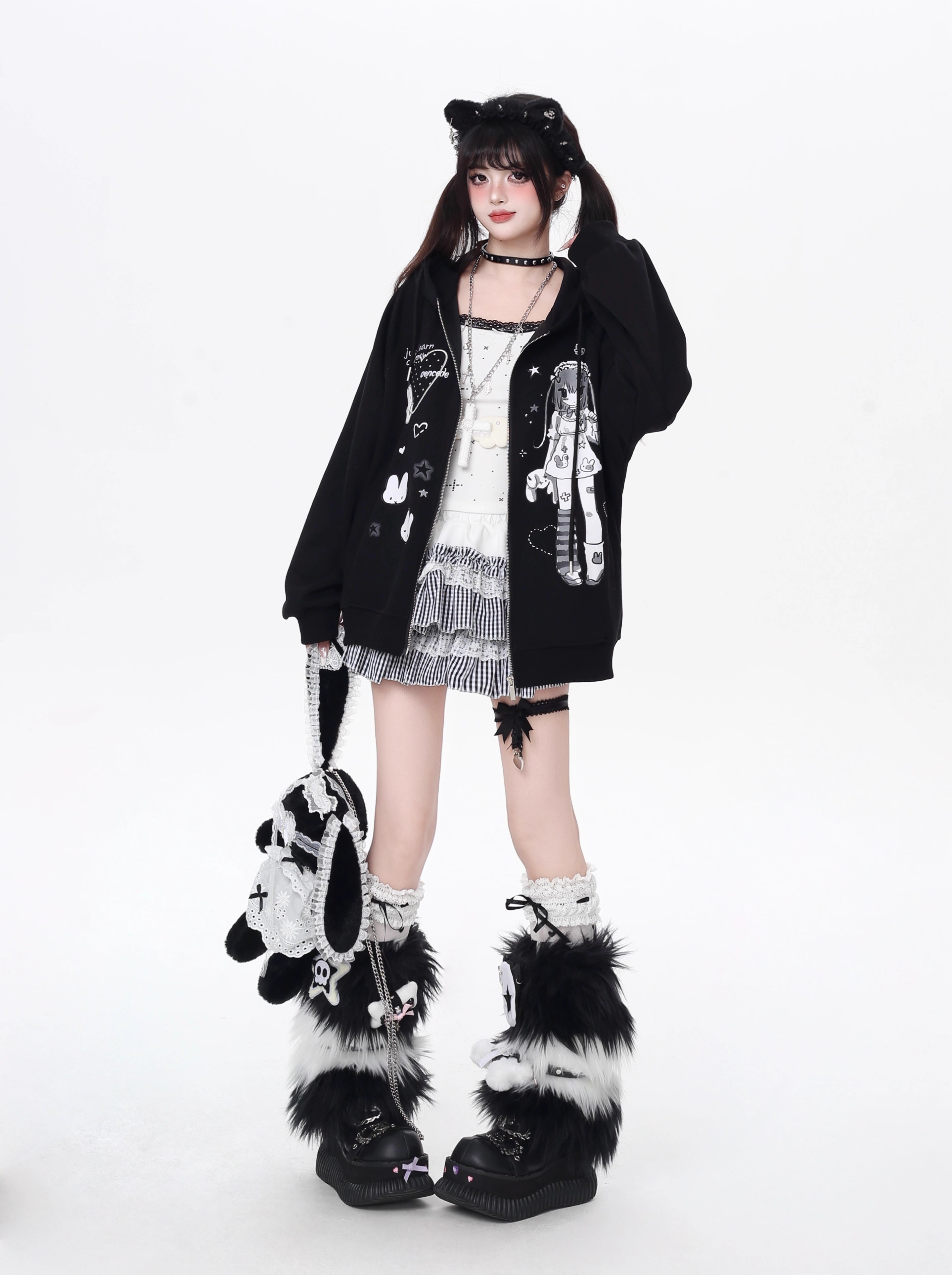 This hoodie blends playful anime-inspired graphics with a relaxed, street-ready silhouette. The high-contrast black and white design creates a bold yet cute statement, while the soft fabric and loose fit ensure all-day comfort. Ideal for expressing quirky, individual style with a touch of urban edge.