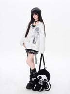 This hoodie blends playful anime-inspired graphics with a relaxed, street-ready silhouette. The high-contrast black and white design creates a bold yet cute statement, while the soft fabric and loose fit ensure all-day comfort. Ideal for expressing quirky, individual style with a touch of urban edge.