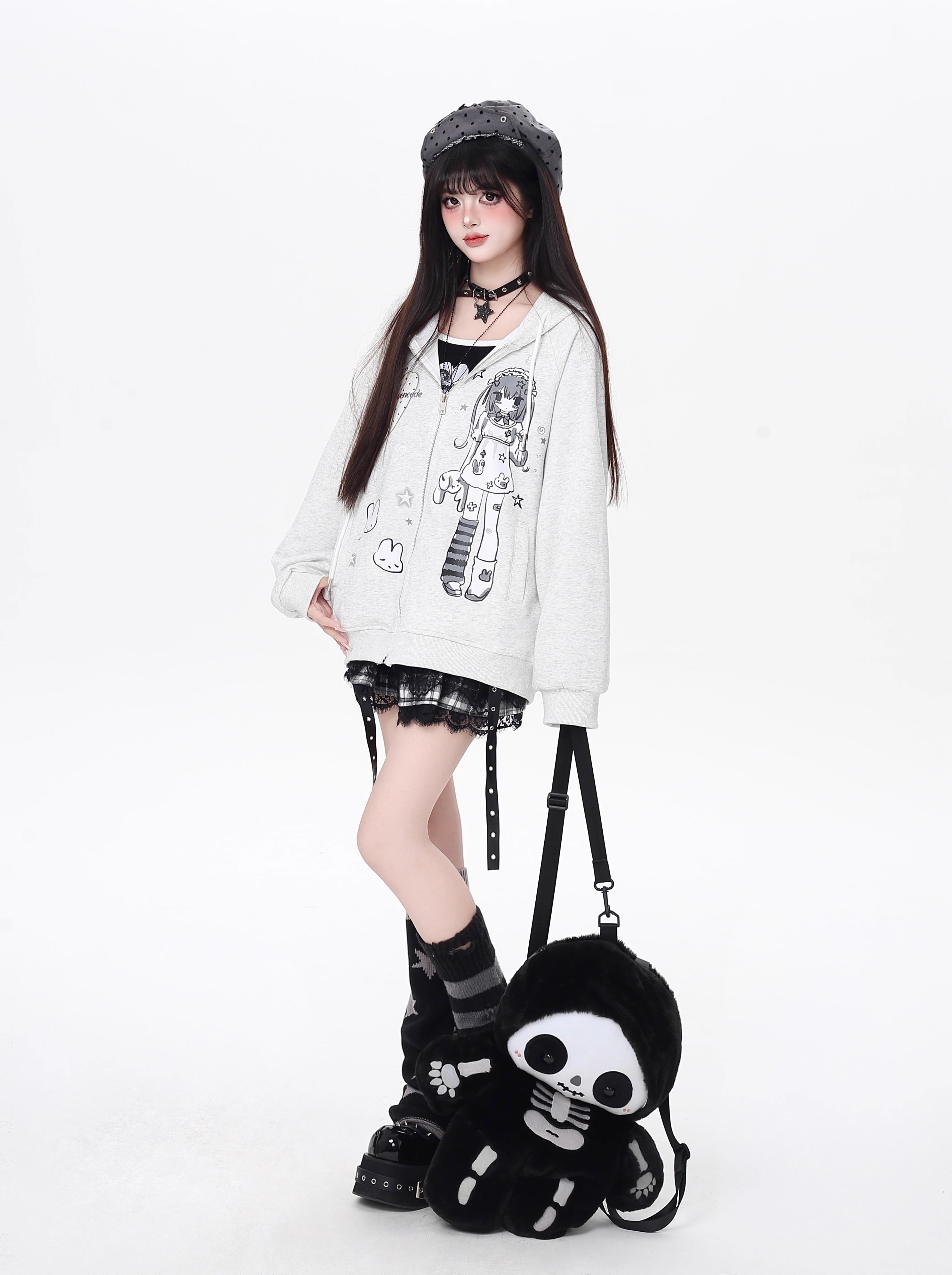 This hoodie blends playful anime-inspired graphics with a relaxed, street-ready silhouette. The high-contrast black and white design creates a bold yet cute statement, while the soft fabric and loose fit ensure all-day comfort. Ideal for expressing quirky, individual style with a touch of urban edge.