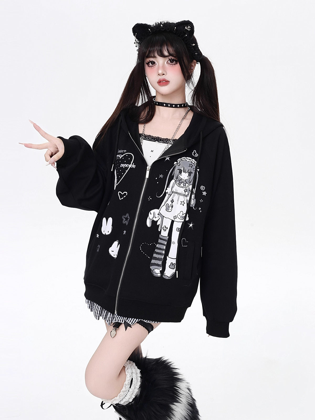 This hoodie blends playful anime-inspired graphics with a relaxed, street-ready silhouette. The high-contrast black and white design creates a bold yet cute statement, while the soft fabric and loose fit ensure all-day comfort. Ideal for expressing quirky, individual style with a touch of urban edge.