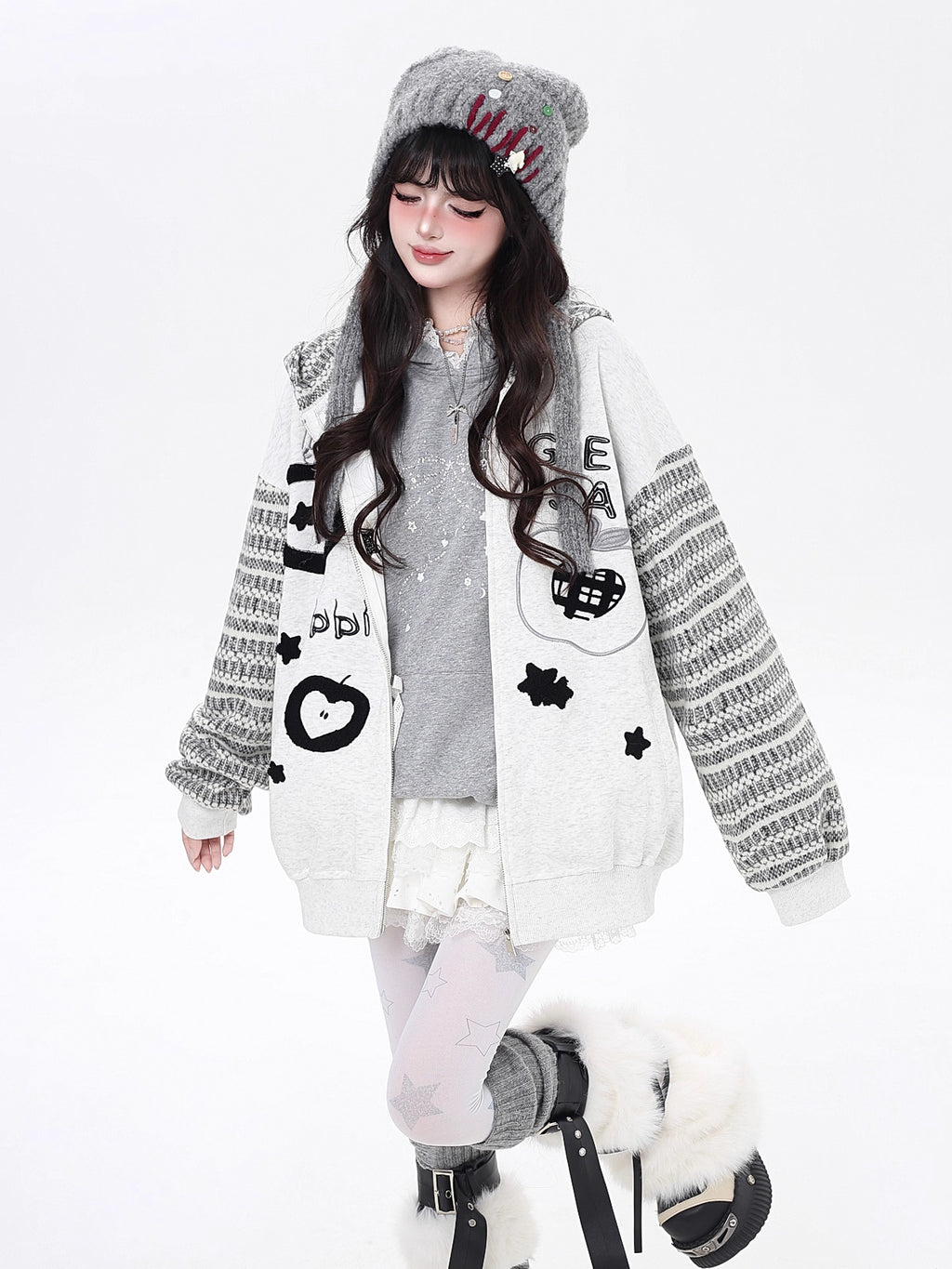 Inspired by quirky American desserts and urban street culture, this hoodie combines bold stripe contrast with detailed embroidery for a fun, laid-back vibe. The loose fit and soft fabric ensure all-day comfort, while the black and grey palette keeps it effortlessly cool. Sweet, edgy, and uniquely stylish.
