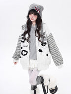 Inspired by quirky American desserts and urban street culture, this hoodie combines bold stripe contrast with detailed embroidery for a fun, laid-back vibe. The loose fit and soft fabric ensure all-day comfort, while the black and grey palette keeps it effortlessly cool. Sweet, edgy, and uniquely stylish.
