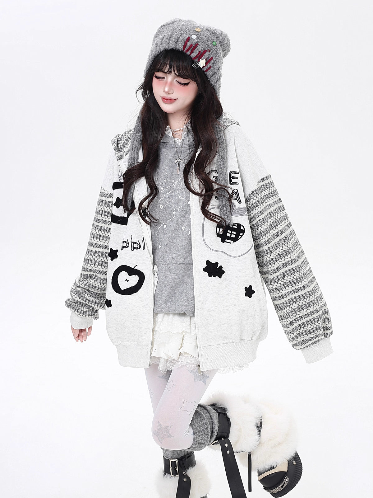 Inspired by quirky American desserts and urban street culture, this hoodie combines bold stripe contrast with detailed embroidery for a fun, laid-back vibe. The loose fit and soft fabric ensure all-day comfort, while the black and grey palette keeps it effortlessly cool. Sweet, edgy, and uniquely stylish.