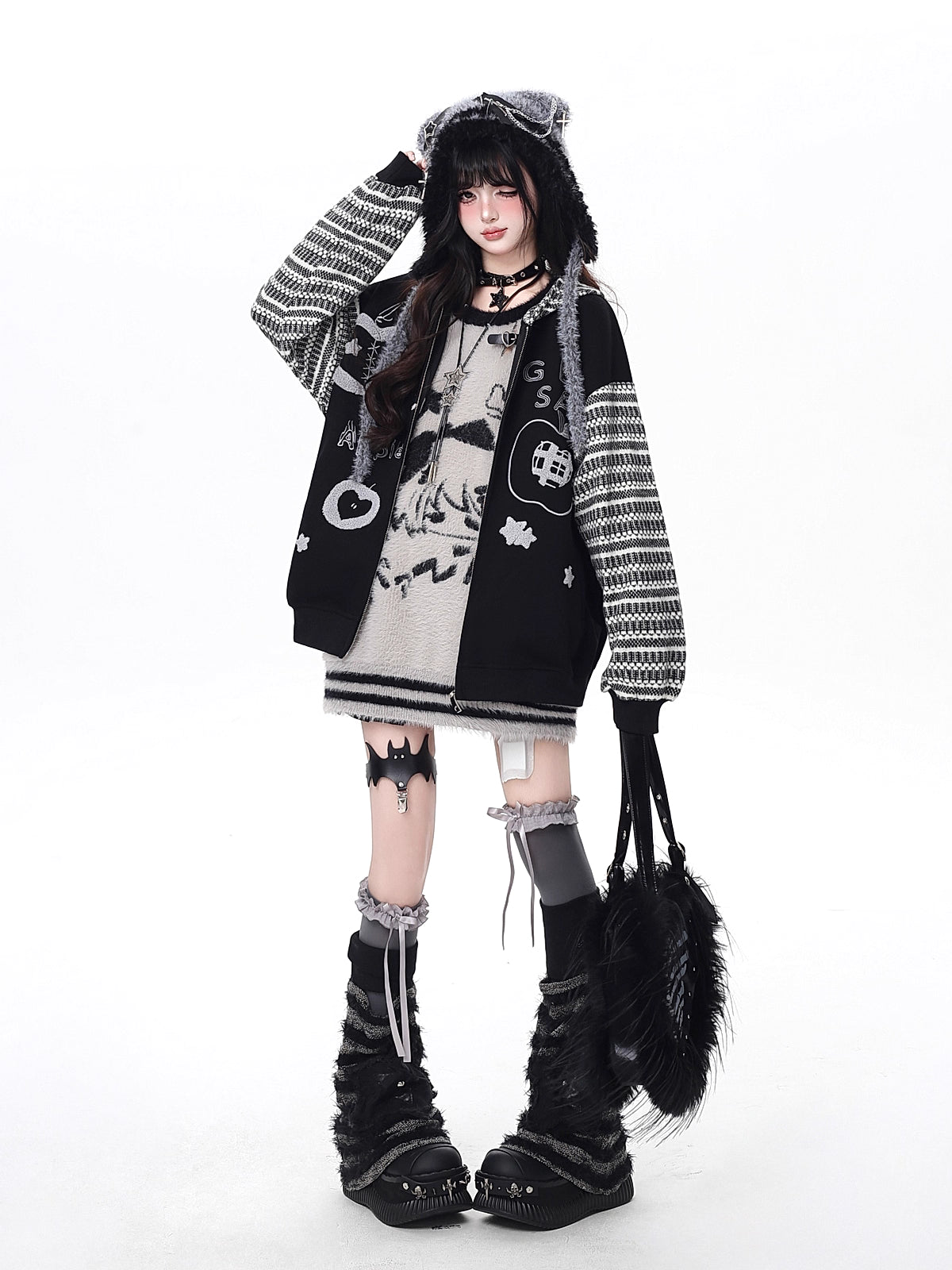 Inspired by quirky American desserts and urban street culture, this hoodie combines bold stripe contrast with detailed embroidery for a fun, laid-back vibe. The loose fit and soft fabric ensure all-day comfort, while the black and grey palette keeps it effortlessly cool. Sweet, edgy, and uniquely stylish.