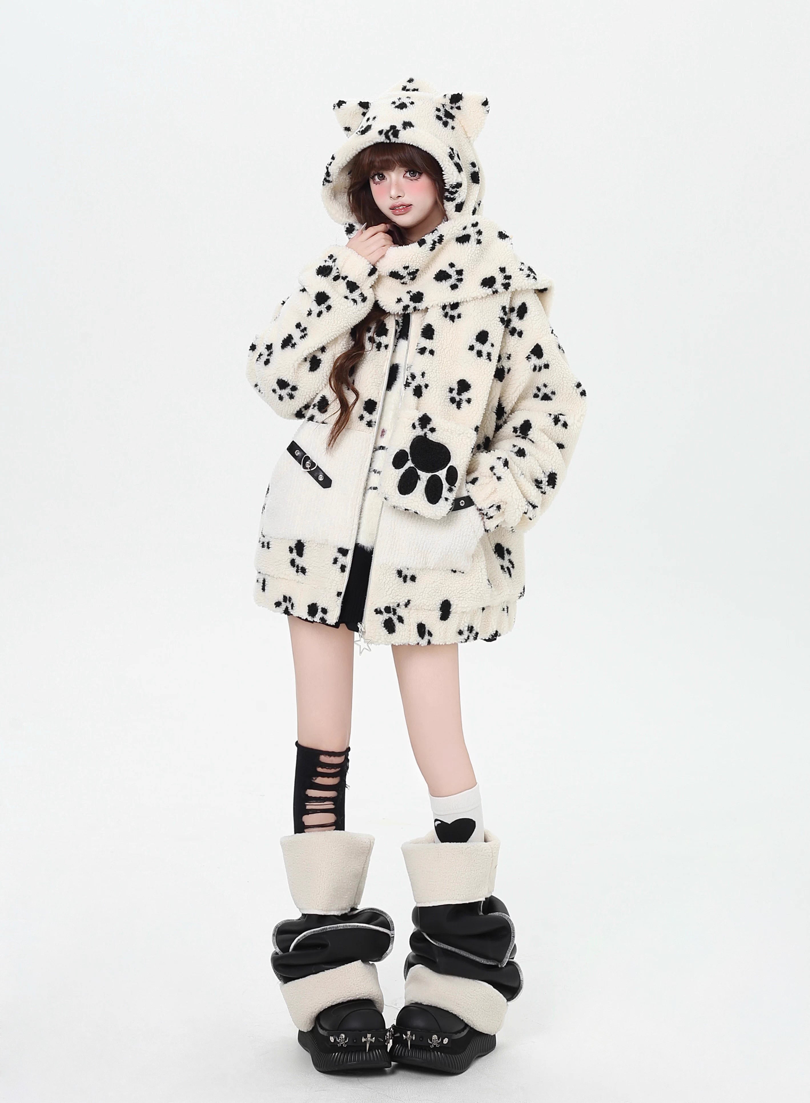 Inspired by the playful warmth of a kitten, this cozy set features a plush sherpa jacket with adorable paw prints, a matching hood, and a versatile scarf. The soft gray and apricot hues evoke a gentle winter charm. Designed for ultimate comfort and whimsical style, it’s perfect for cold days spent curled up or exploring. Embrace a touch of feline-inspired fun!
