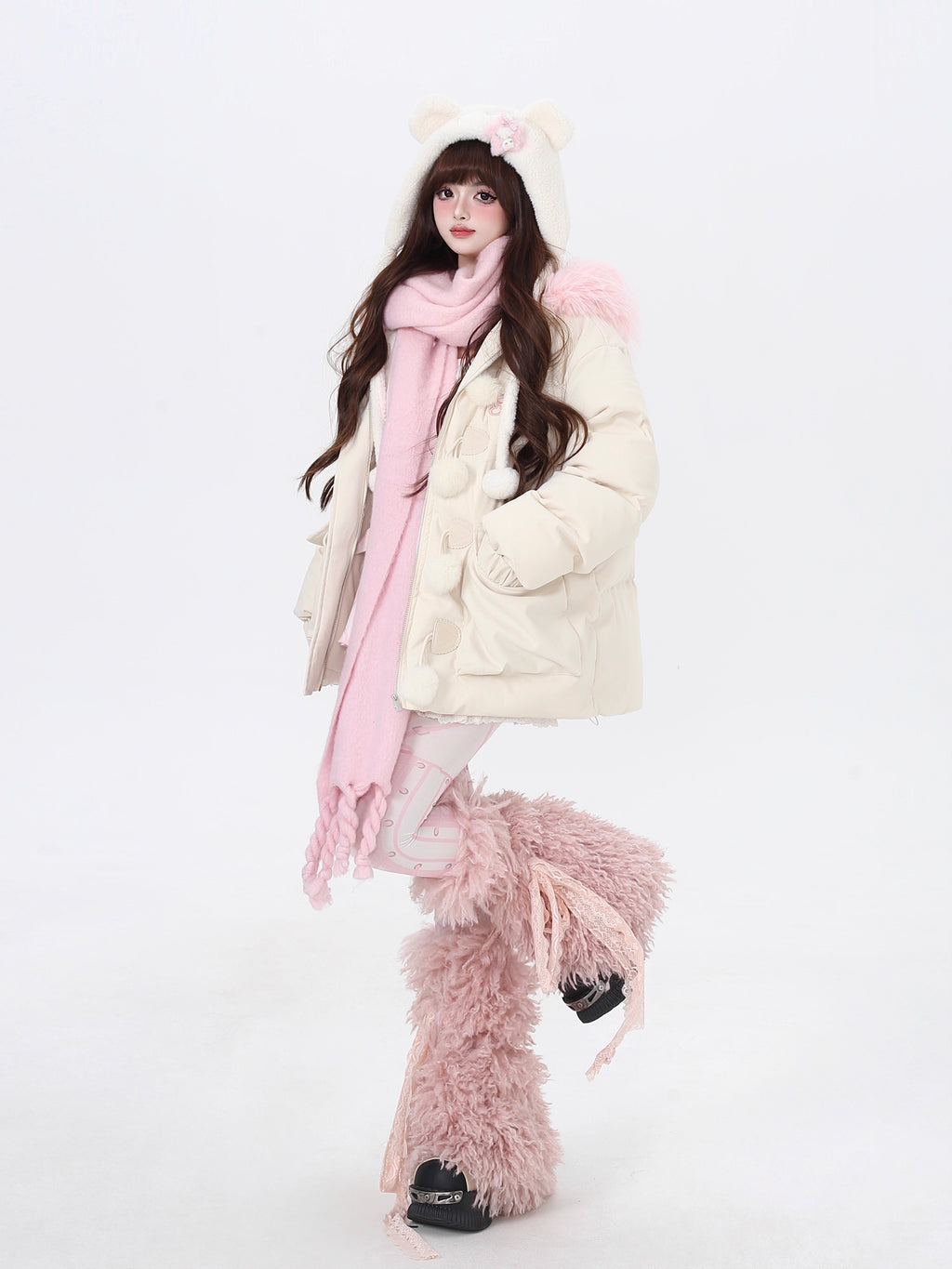 Designed for ultimate cozy charm, this oversized parka combines a soft fleece interior and a luxurious fur-trimmed hood for warmth and style. The sweet yet modern apricot and black palette complements any winter outfit. Perfect for staying snug while looking effortlessly cute on cold days. Embrace comfort with a touch of playful elegance.