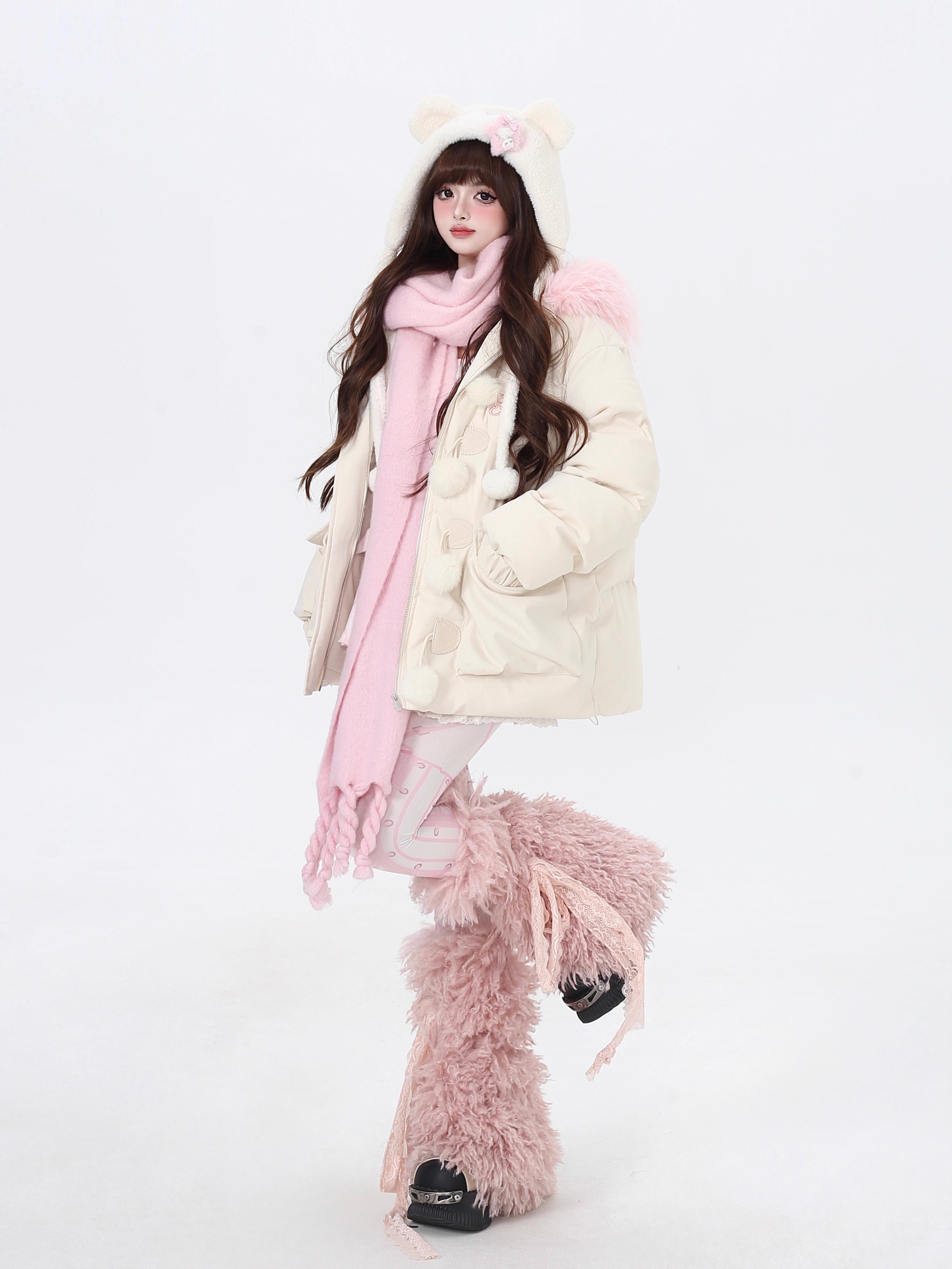 Designed for ultimate cozy charm, this oversized parka combines a soft fleece interior and a luxurious fur-trimmed hood for warmth and style. The sweet yet modern apricot and black palette complements any winter outfit. Perfect for staying snug while looking effortlessly cute on cold days. Embrace comfort with a touch of playful elegance.
