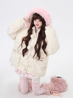 Designed for ultimate cozy charm, this oversized parka combines a soft fleece interior and a luxurious fur-trimmed hood for warmth and style. The sweet yet modern apricot and black palette complements any winter outfit. Perfect for staying snug while looking effortlessly cute on cold days. Embrace comfort with a touch of playful elegance.