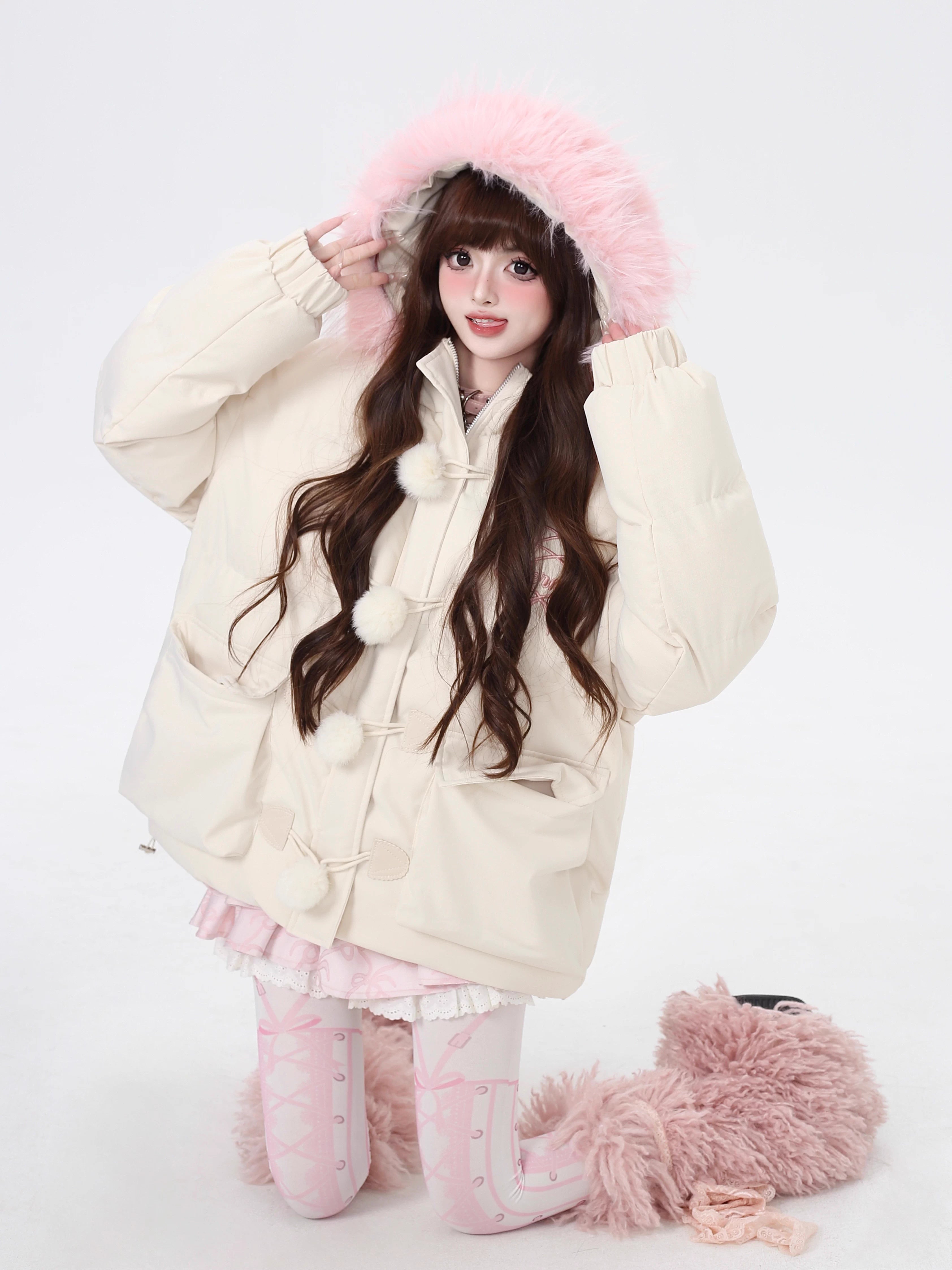 Designed for ultimate cozy charm, this oversized parka combines a soft fleece interior and a luxurious fur-trimmed hood for warmth and style. The sweet yet modern apricot and black palette complements any winter outfit. Perfect for staying snug while looking effortlessly cute on cold days. Embrace comfort with a touch of playful elegance.