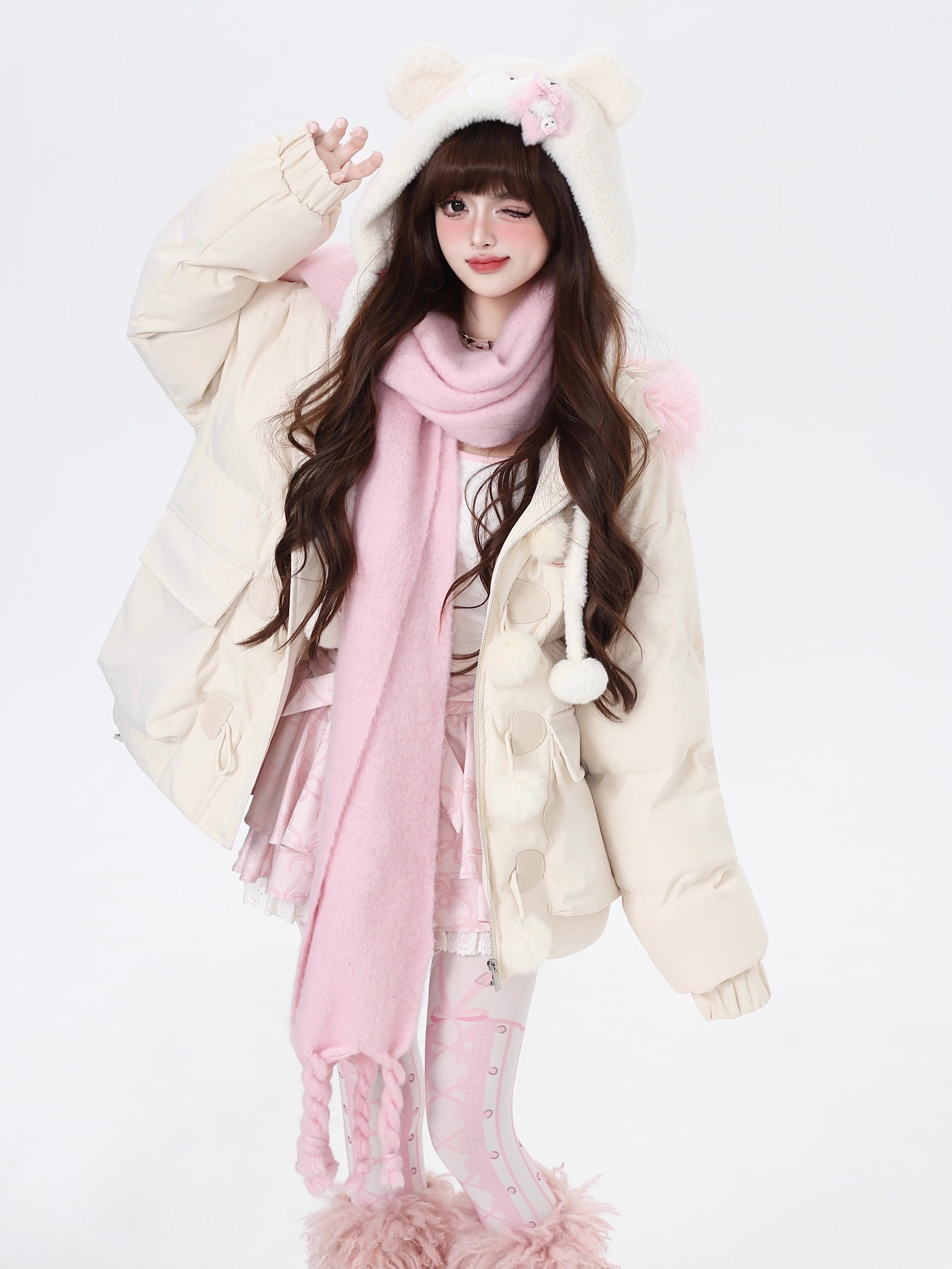 Designed for ultimate cozy charm, this oversized parka combines a soft fleece interior and a luxurious fur-trimmed hood for warmth and style. The sweet yet modern apricot and black palette complements any winter outfit. Perfect for staying snug while looking effortlessly cute on cold days. Embrace comfort with a touch of playful elegance.