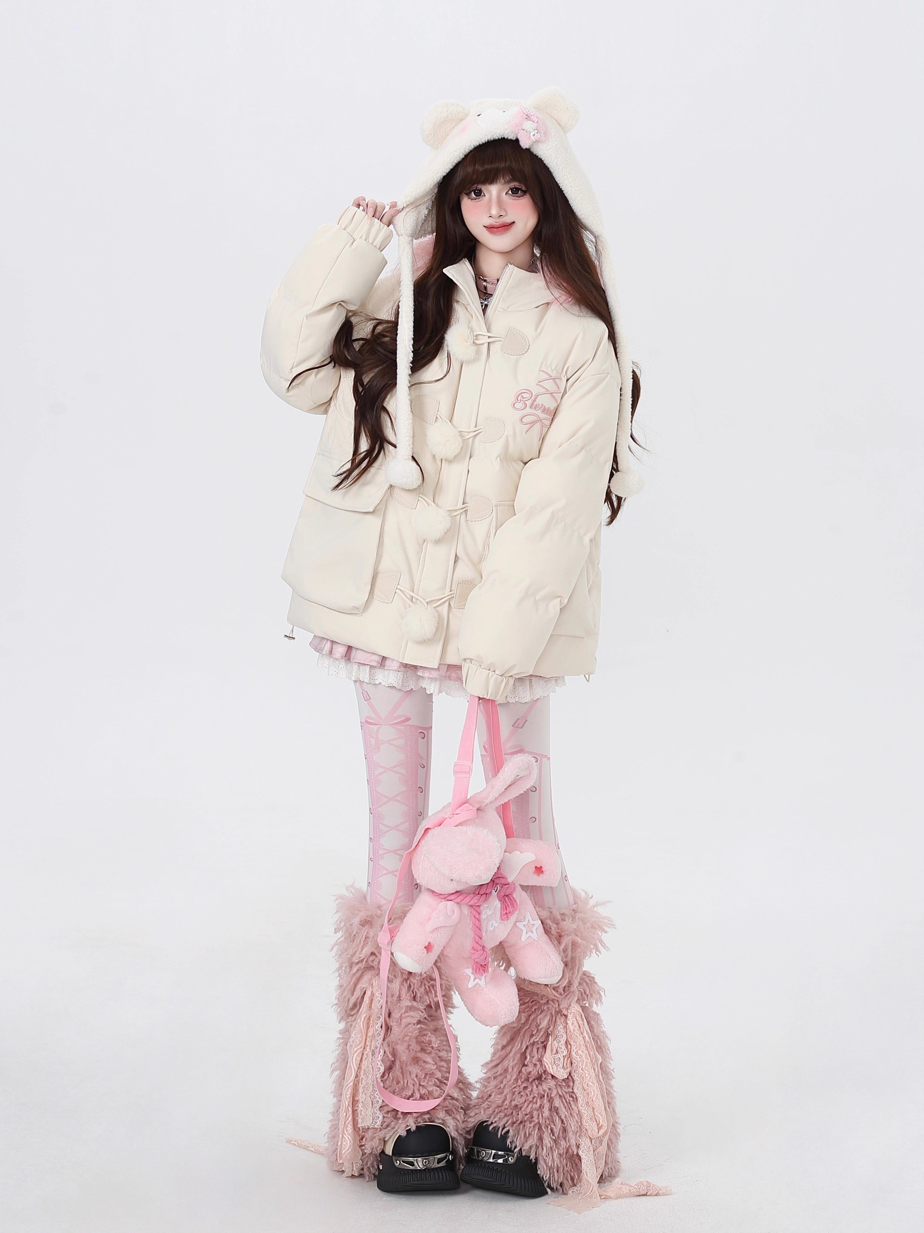 Designed for ultimate cozy charm, this oversized parka combines a soft fleece interior and a luxurious fur-trimmed hood for warmth and style. The sweet yet modern apricot and black palette complements any winter outfit. Perfect for staying snug while looking effortlessly cute on cold days. Embrace comfort with a touch of playful elegance.
