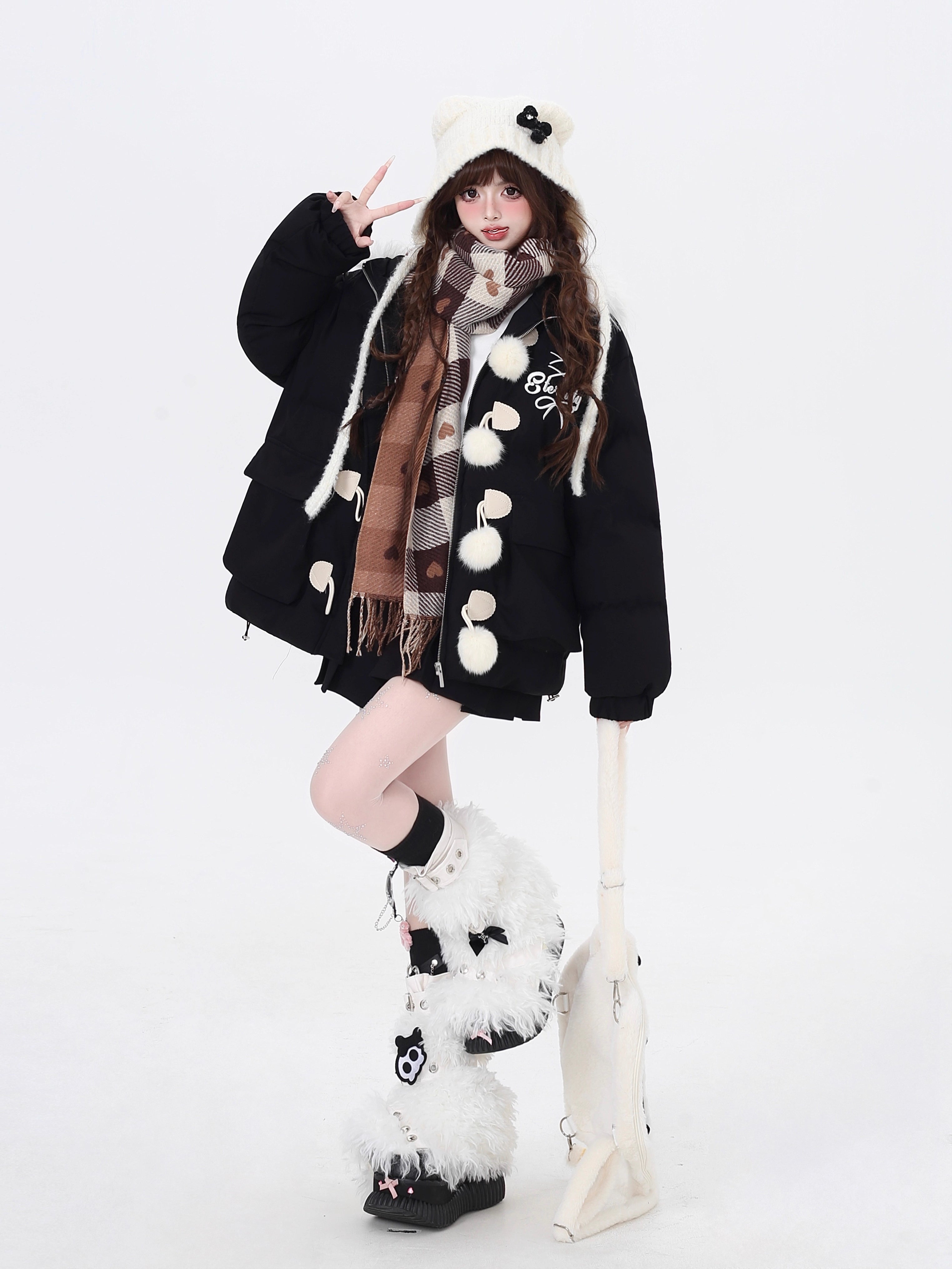 Designed for ultimate cozy charm, this oversized parka combines a soft fleece interior and a luxurious fur-trimmed hood for warmth and style. The sweet yet modern apricot and black palette complements any winter outfit. Perfect for staying snug while looking effortlessly cute on cold days. Embrace comfort with a touch of playful elegance.