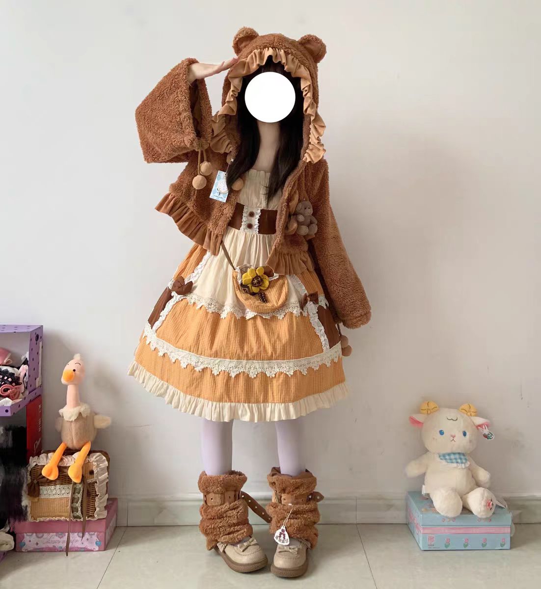 This Lolita Plush Coat in black, white, and brown tones is designed to bring both warmth and sweetness to your autumn and winter wardrobe. Made with thick plush fabric, it offers cozy comfort while maintaining a cute, doll-like charm. The short silhouette enhances a playful look, making it easy to pair with Lolita dresses or casual outfits. Perfect for daily wear, tea parties, or outdoor gatherings, this coat balances practicality with the whimsical spirit of Lolita fashion.