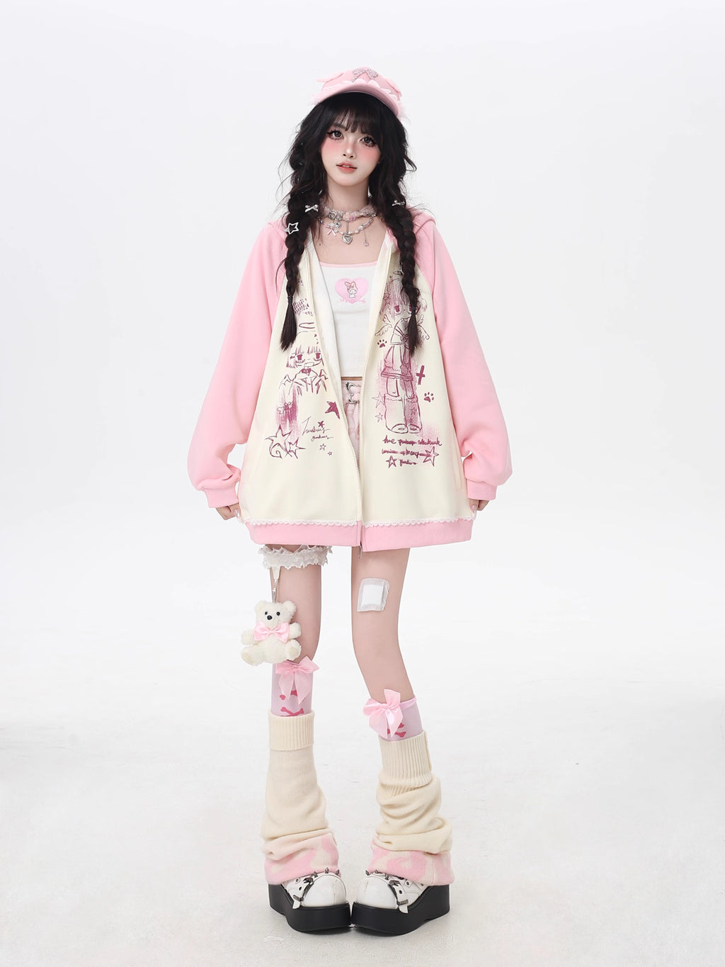This Lolita Coats Japanese-inspired hoodie combines playful manga print elements with a soft color-block design in black, white, pink, and apricot. Crafted for a relaxed, loose fit, it offers casual comfort while adding a touch of Y2K and Japanese streetwear charm to your autumn wardrobe. Perfect for daily wear, the lightweight fabric ensures ease of movement, and the cozy hood adds both style and practicality. This versatile piece effortlessly blends cute, edgy, and casual aesthetics for a standout seasona