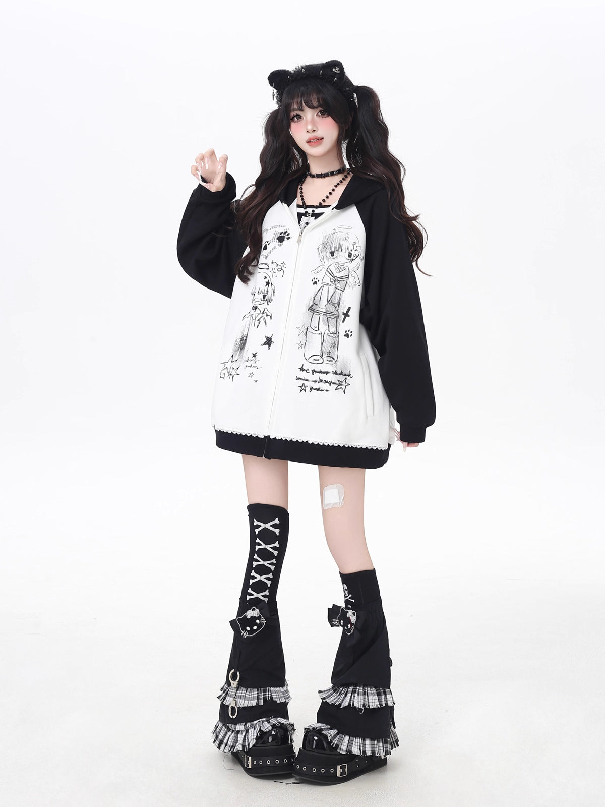 This Lolita Coats Japanese-inspired hoodie combines playful manga print elements with a soft color-block design in black, white, pink, and apricot. Crafted for a relaxed, loose fit, it offers casual comfort while adding a touch of Y2K and Japanese streetwear charm to your autumn wardrobe. Perfect for daily wear, the lightweight fabric ensures ease of movement, and the cozy hood adds both style and practicality. This versatile piece effortlessly blends cute, edgy, and casual aesthetics for a standout seasona
