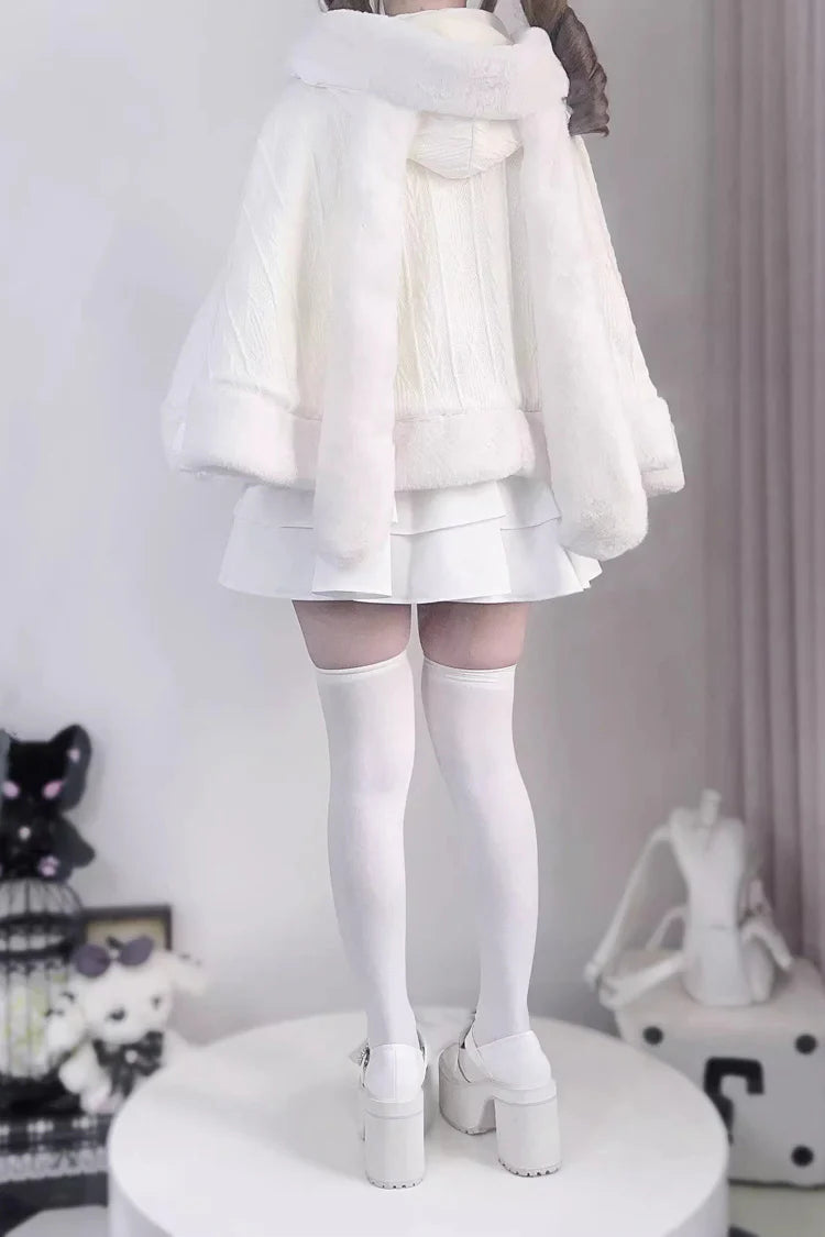 Blending whimsy with elegance, this cape coat transforms classic Lolita charm into a versatile outerwear piece. The playful rabbit ears and delicate bow contrast the monochrome palette, creating a striking balance between sweetness and sophistication. Designed with a flowing silhouette and single-row button closure, it offers effortless layering for cool days—perfect for adding a touch of fantasy to both casual and formal Lolita coordinates.
