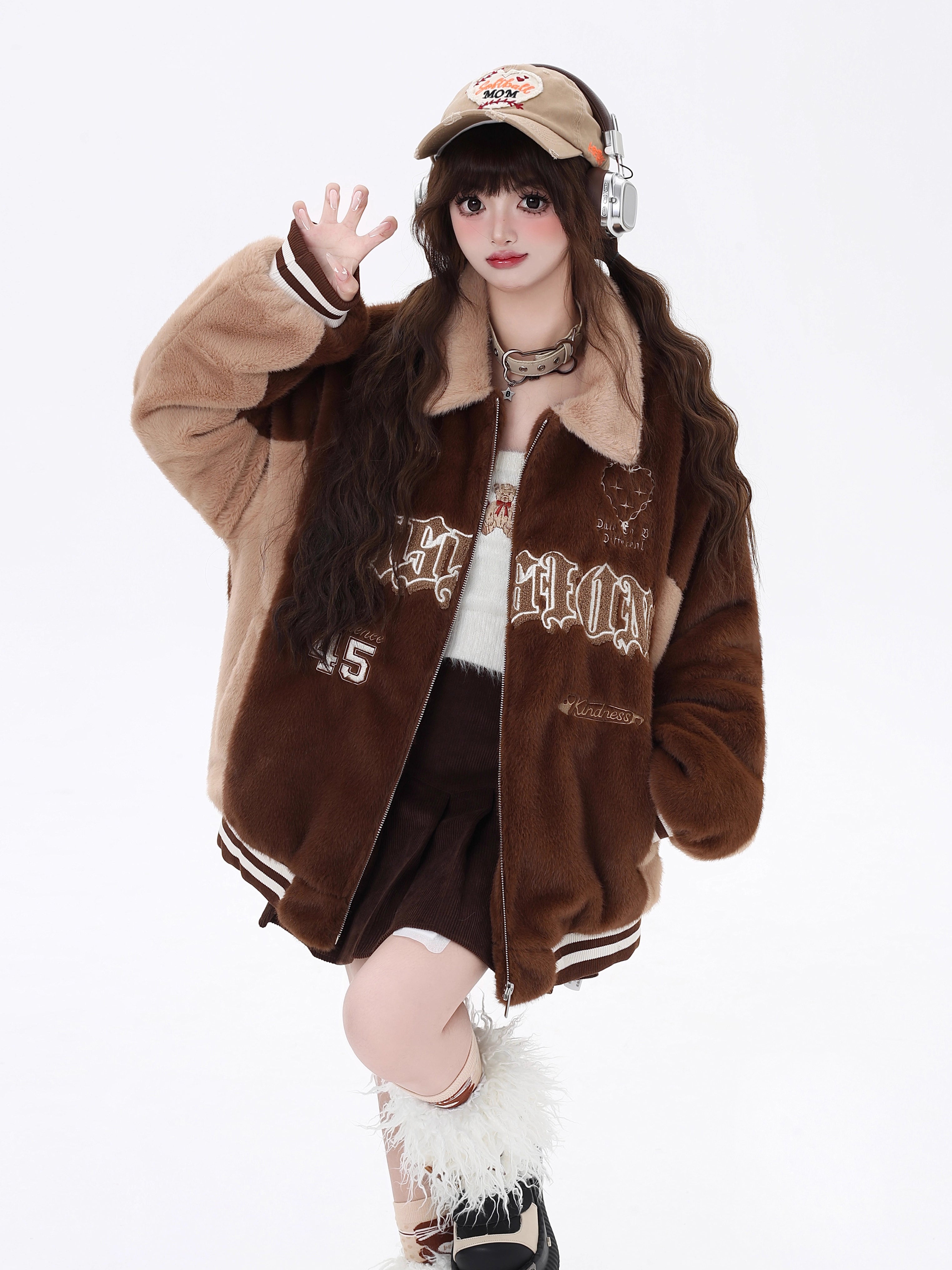 Inspired by classic Ivy League style, this jacket combines vintage charm with modern warmth. It features premium sherpa lining, bold color-blocking, and intricate embroidered details for a touch of sophistication. The quilted construction and cozy fit make it perfect for crisp winter days on campus or in the city. Timeless, rugged, and effortlessly cool.