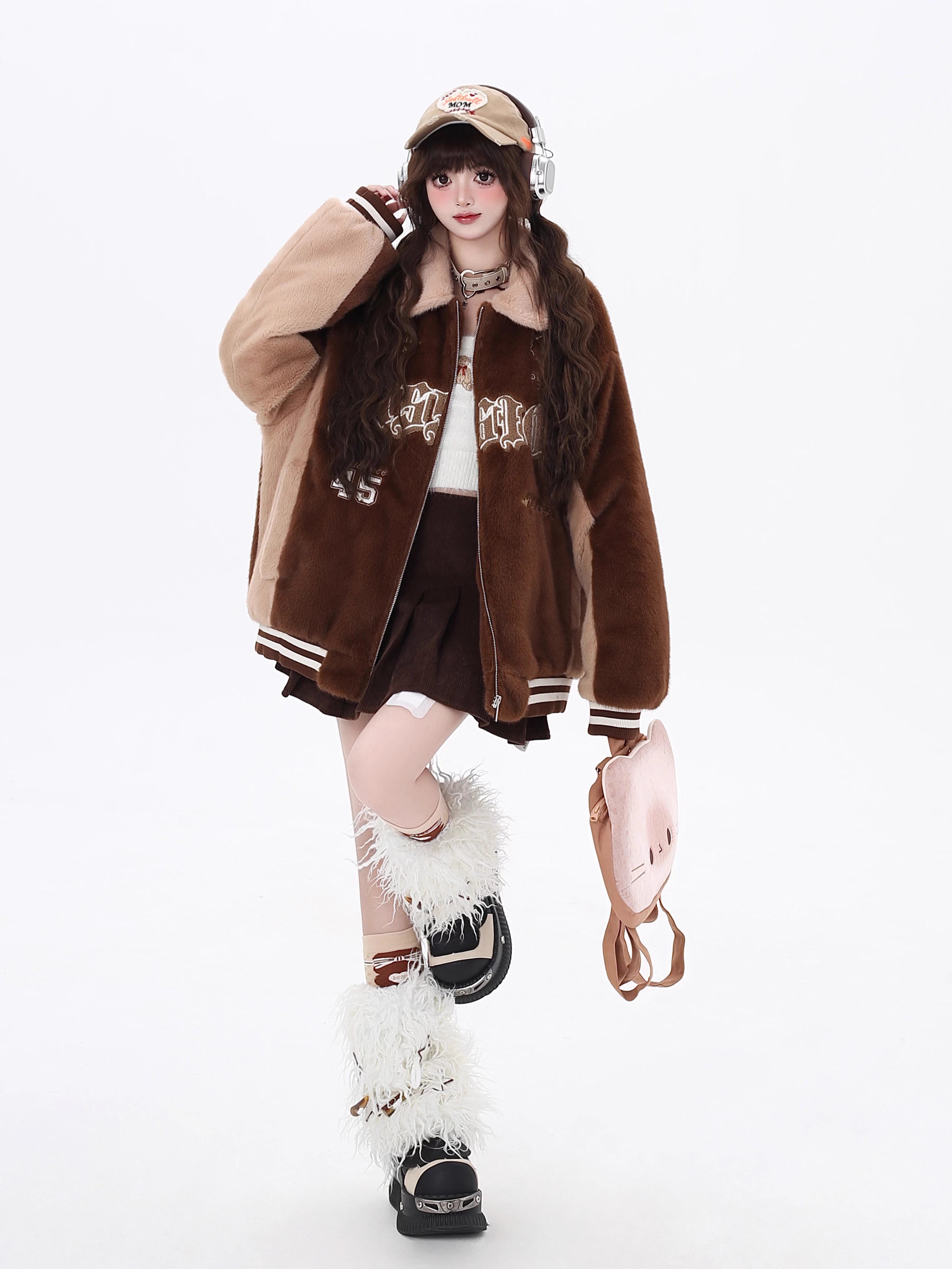 Inspired by classic Ivy League style, this jacket combines vintage charm with modern warmth. It features premium sherpa lining, bold color-blocking, and intricate embroidered details for a touch of sophistication. The quilted construction and cozy fit make it perfect for crisp winter days on campus or in the city. Timeless, rugged, and effortlessly cool.
