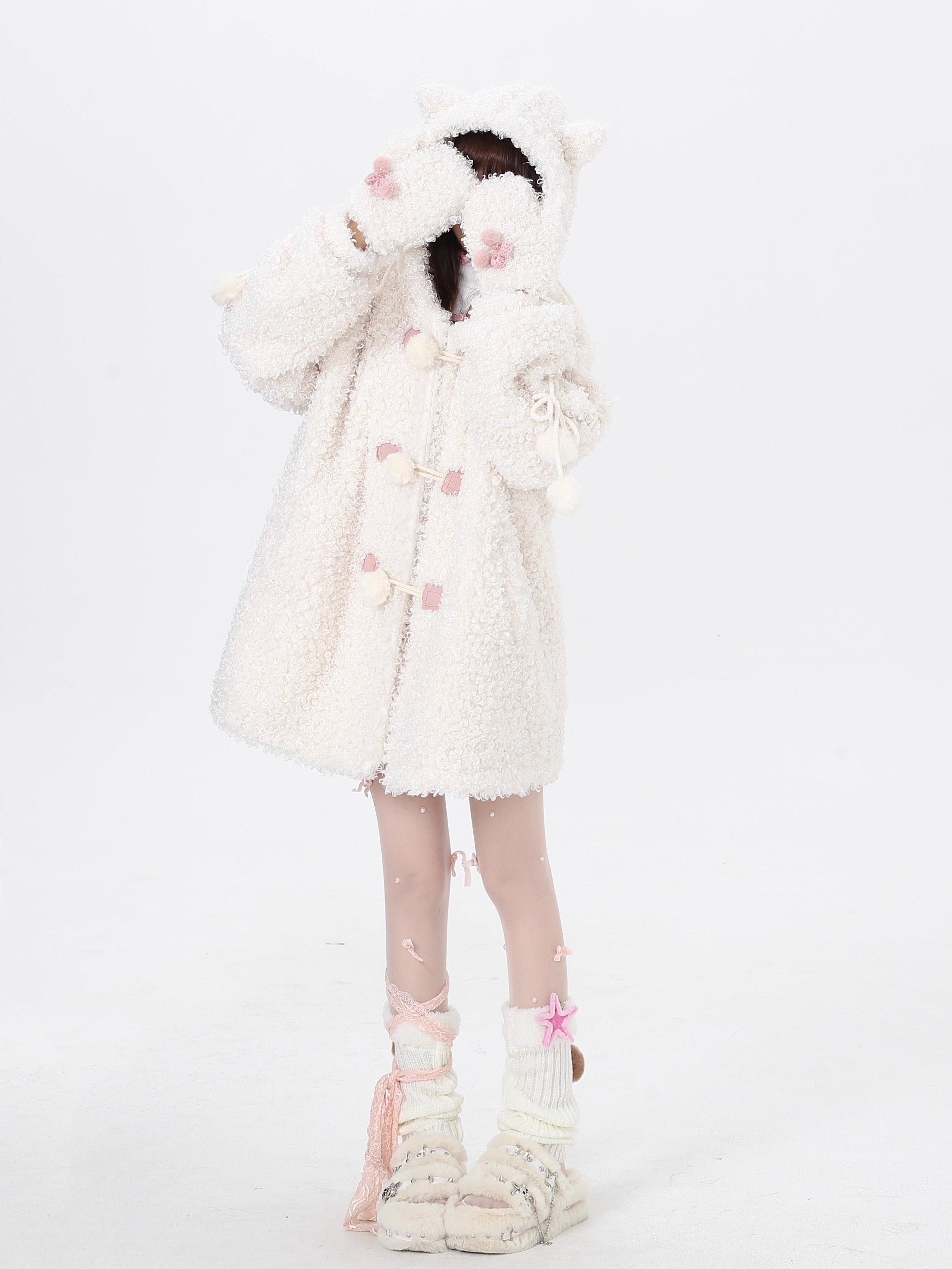 Inspired by the playful charm of a kitten, this ultra-plush sherpa jacket features adorable cat ears on the hood and an oversized cozy fit. The creamy white hue adds a touch of sweetness, while the thick lining ensures warmth without sacrificing style. Perfect for expressing a soft, whimsical aesthetic during cold days.
