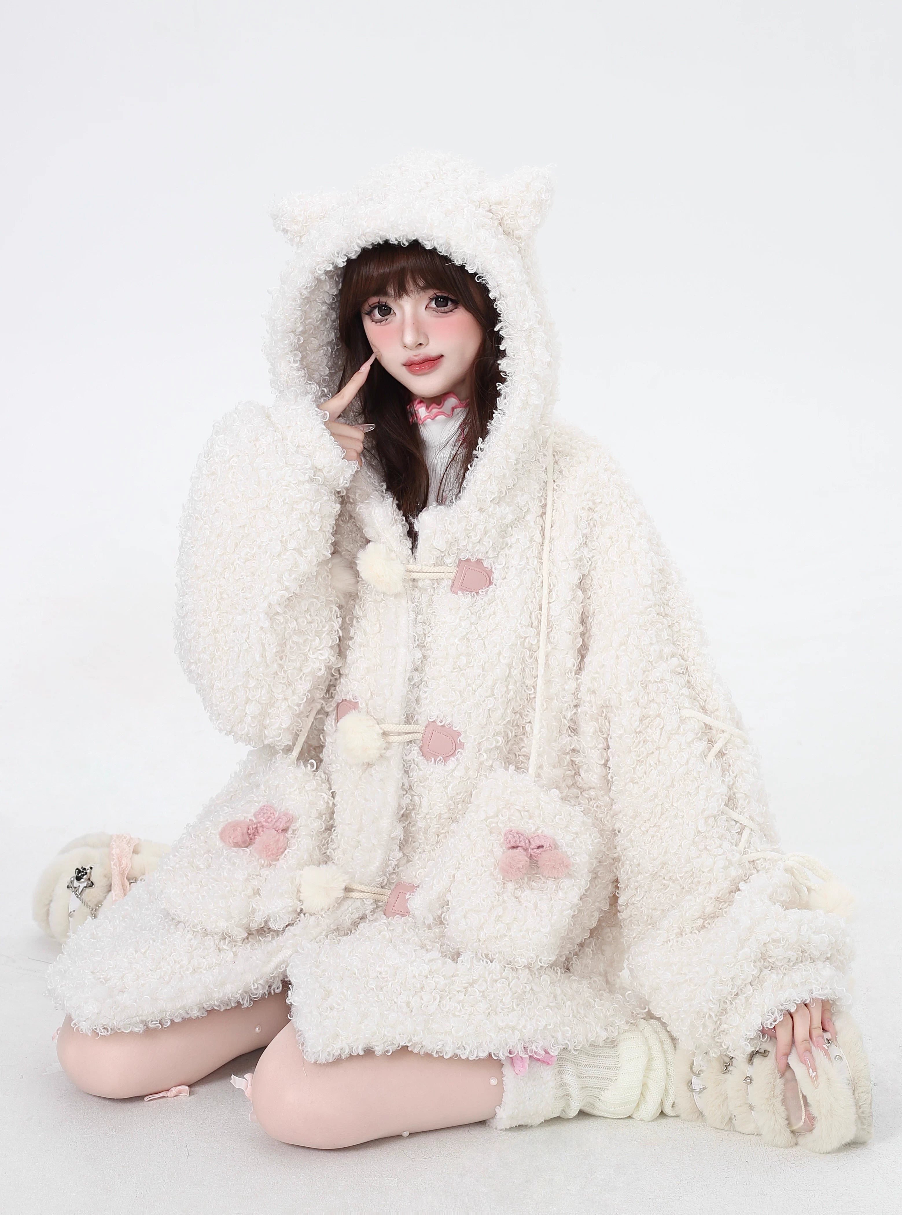 Inspired by the playful charm of a kitten, this ultra-plush sherpa jacket features adorable cat ears on the hood and an oversized cozy fit. The creamy white hue adds a touch of sweetness, while the thick lining ensures warmth without sacrificing style. Perfect for expressing a soft, whimsical aesthetic during cold days.