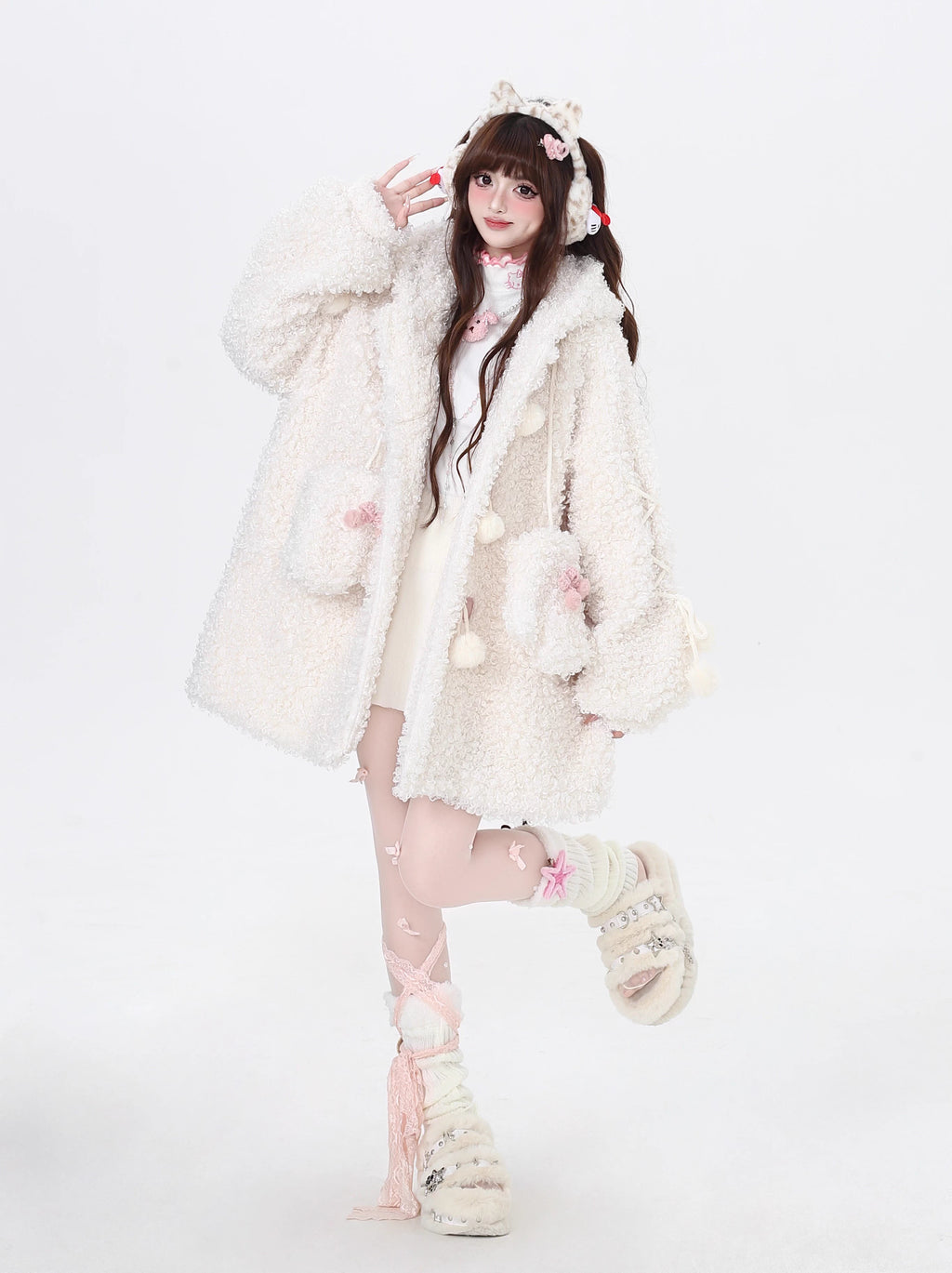 Inspired by the playful charm of a kitten, this ultra-plush sherpa jacket features adorable cat ears on the hood and an oversized cozy fit. The creamy white hue adds a touch of sweetness, while the thick lining ensures warmth without sacrificing style. Perfect for expressing a soft, whimsical aesthetic during cold days.
