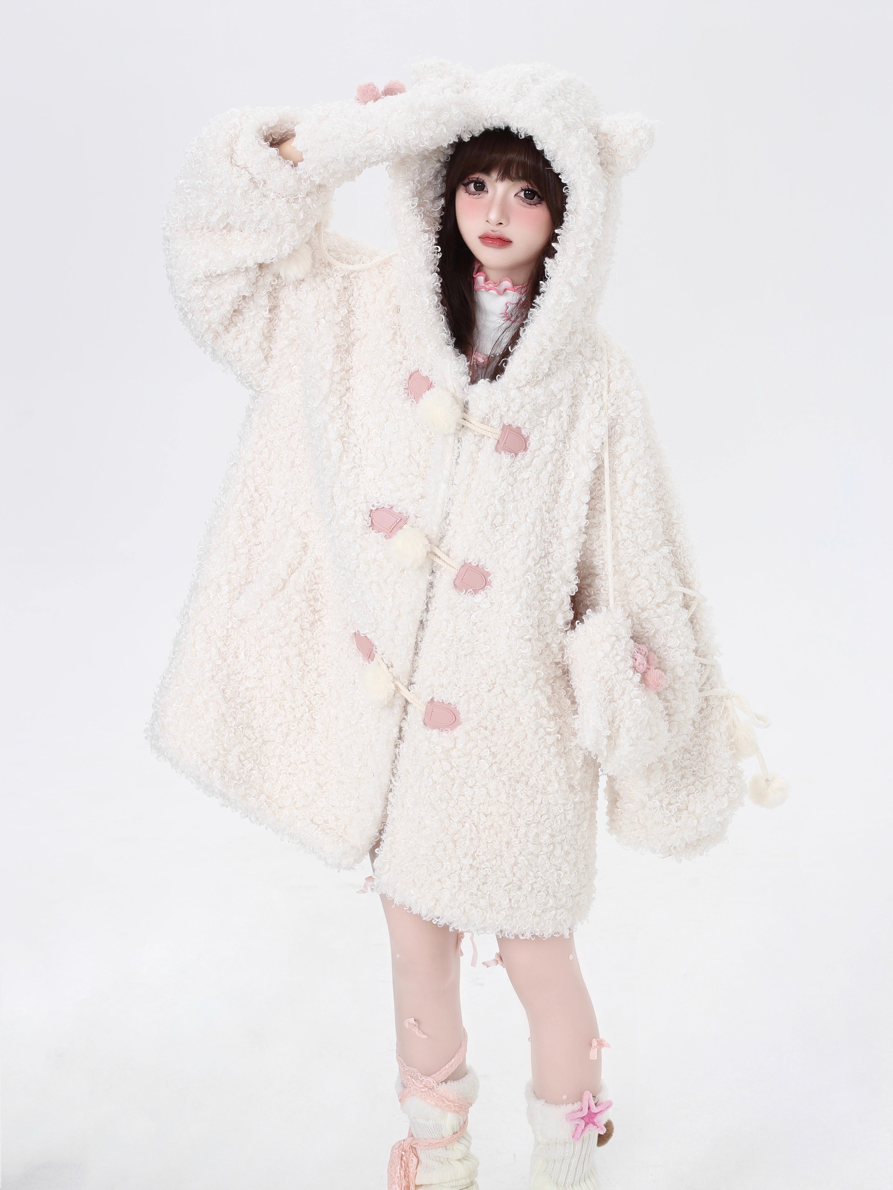 Inspired by the playful charm of a kitten, this ultra-plush sherpa jacket features adorable cat ears on the hood and an oversized cozy fit. The creamy white hue adds a touch of sweetness, while the thick lining ensures warmth without sacrificing style. Perfect for expressing a soft, whimsical aesthetic during cold days.