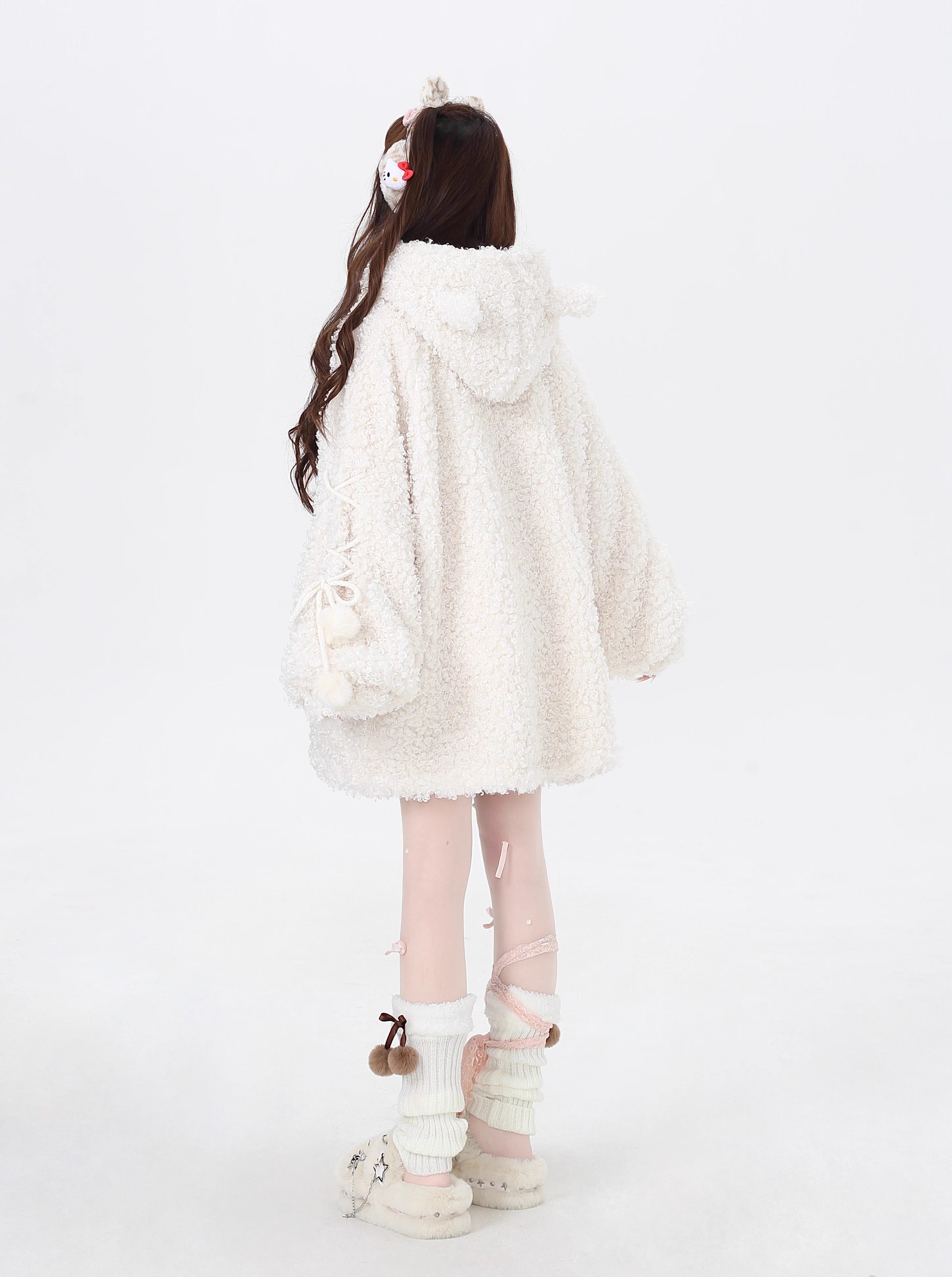 Inspired by the playful charm of a kitten, this ultra-plush sherpa jacket features adorable cat ears on the hood and an oversized cozy fit. The creamy white hue adds a touch of sweetness, while the thick lining ensures warmth without sacrificing style. Perfect for expressing a soft, whimsical aesthetic during cold days.